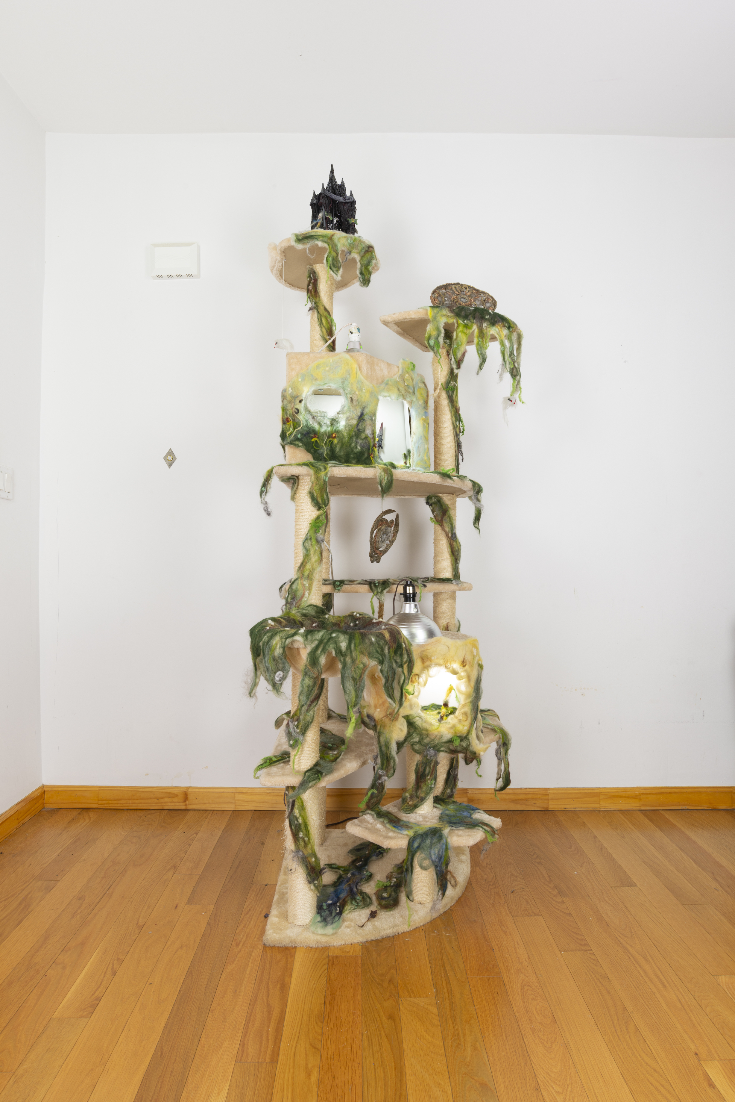  Anna Slama, Marek Delong,  ANDROMEDA , 2019, 92”x24”x24”, wool, clay, fabric, resin installed on cat tree 