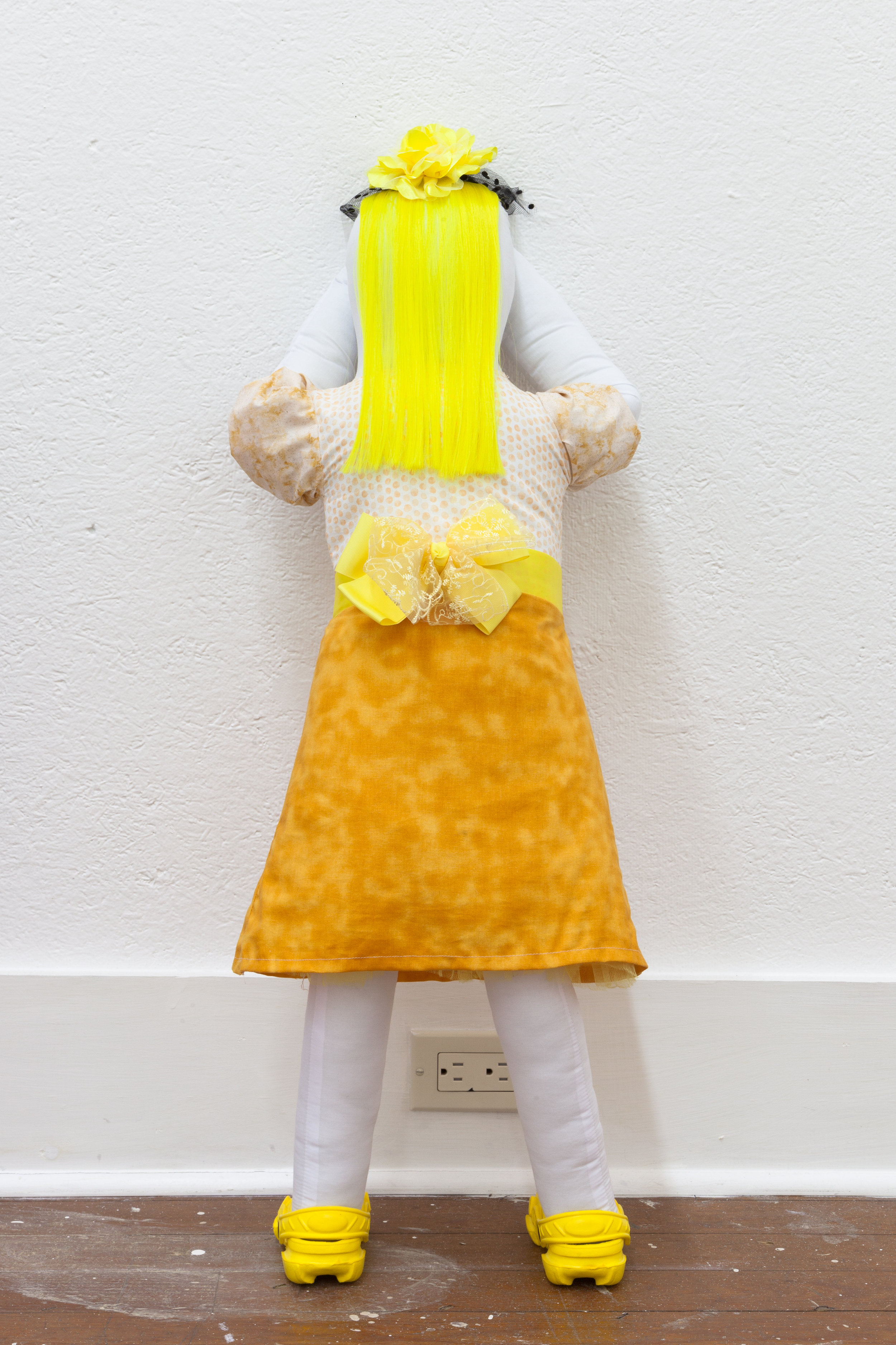  Abby Lloyd, Brigid, 2019, Fabric, Poly-Fil, ribbon, hair extensions, found materials Approximately 36 x 14 inches 