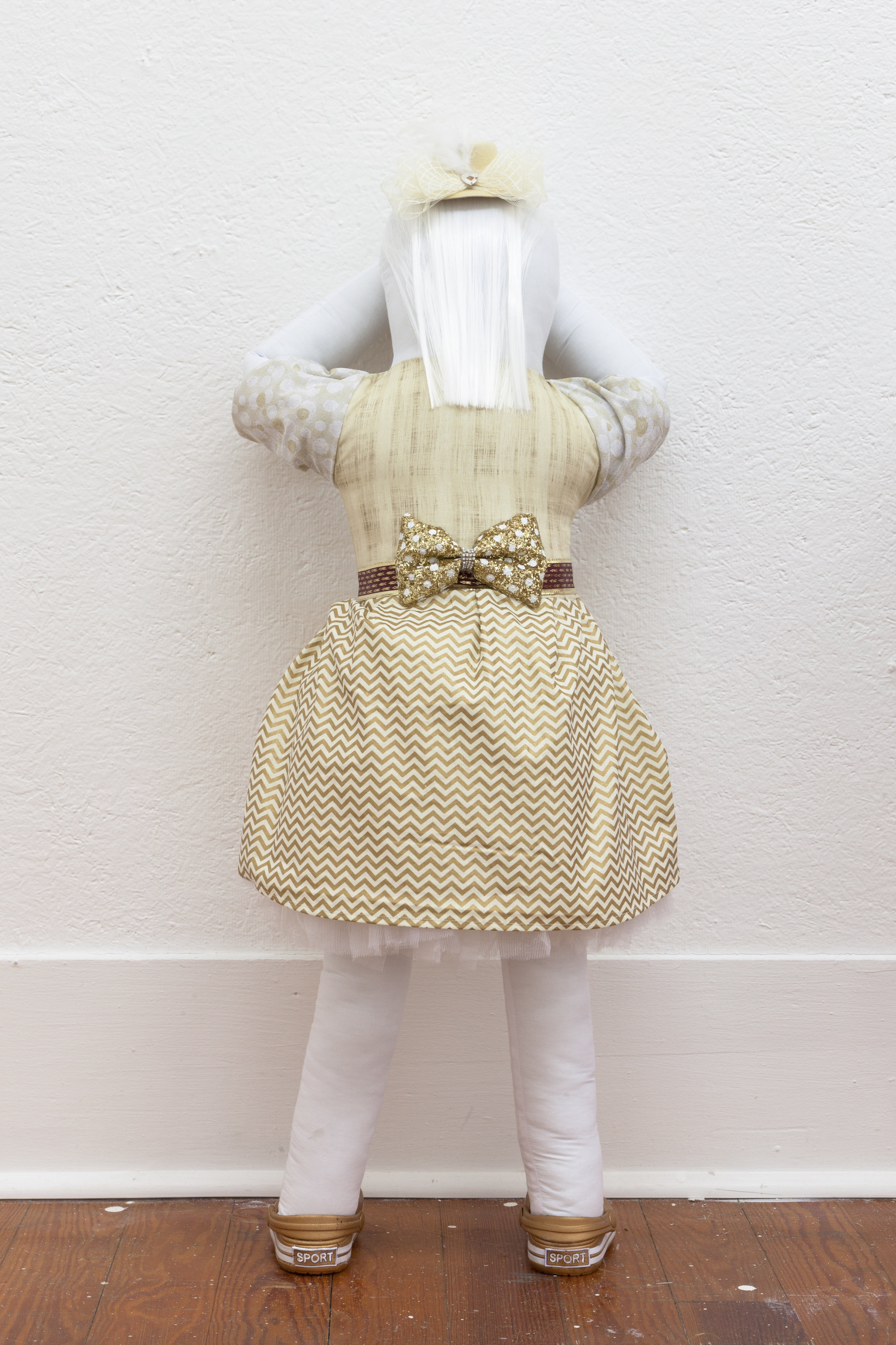  Abby Lloyd, Mary, 2019. Fabric, Poly-Fil, ribbon, hair extensions, found materials Approximately 36 x 14 inches 