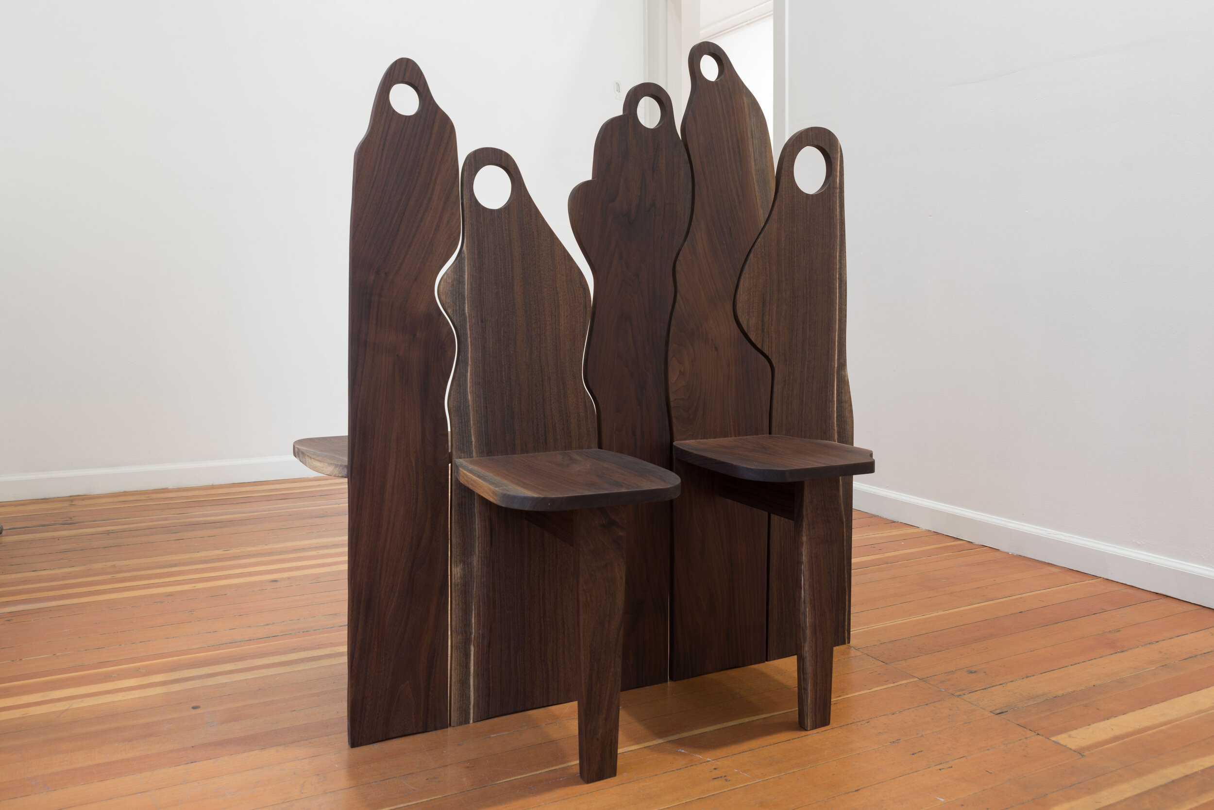   step-ups , five interlocking walnut chairs, 2019. 