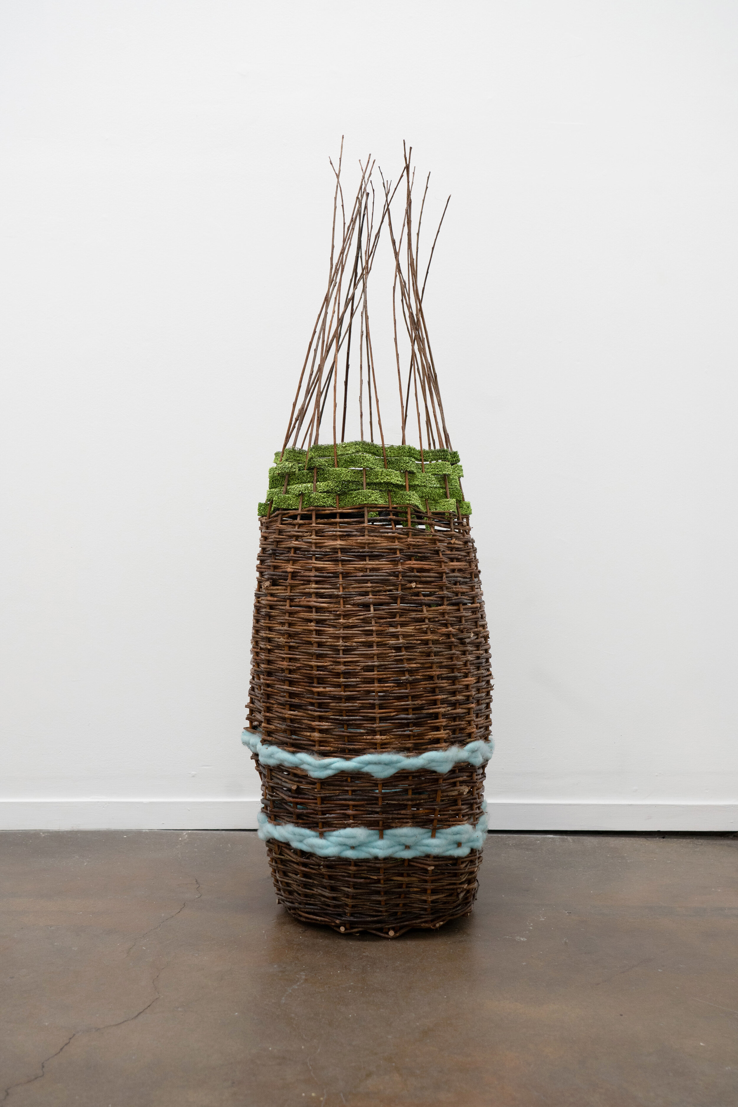  Teresa Baker,  Fishing Basket , 2019, Willow, Yarn, AstroTurf, 47 H x 32" Circumference 