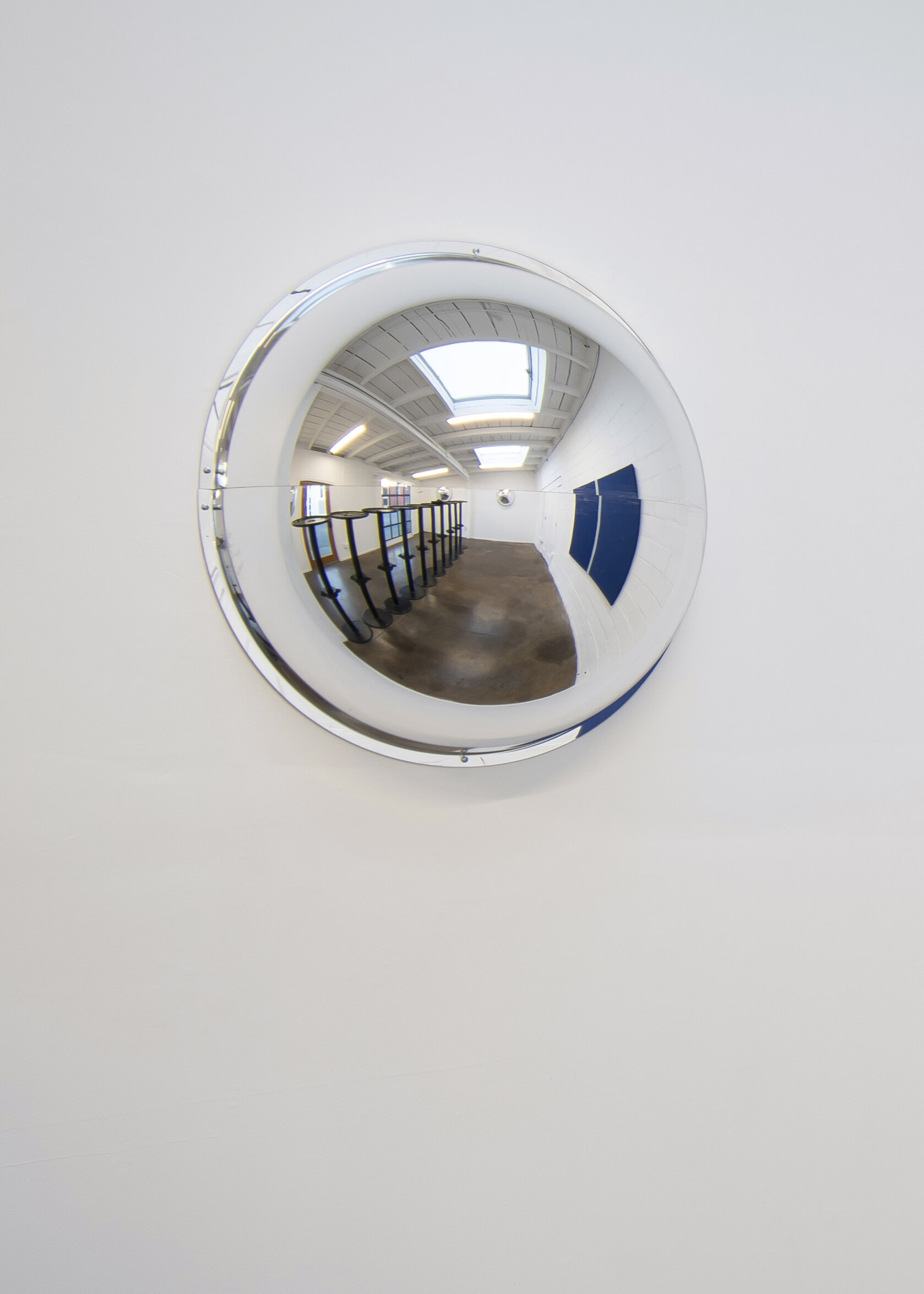 Débora Delmar,  Guarded View I , 2020. 26-inch diameter. SeeAll Half Dome Acrylic Security Mirrors. 