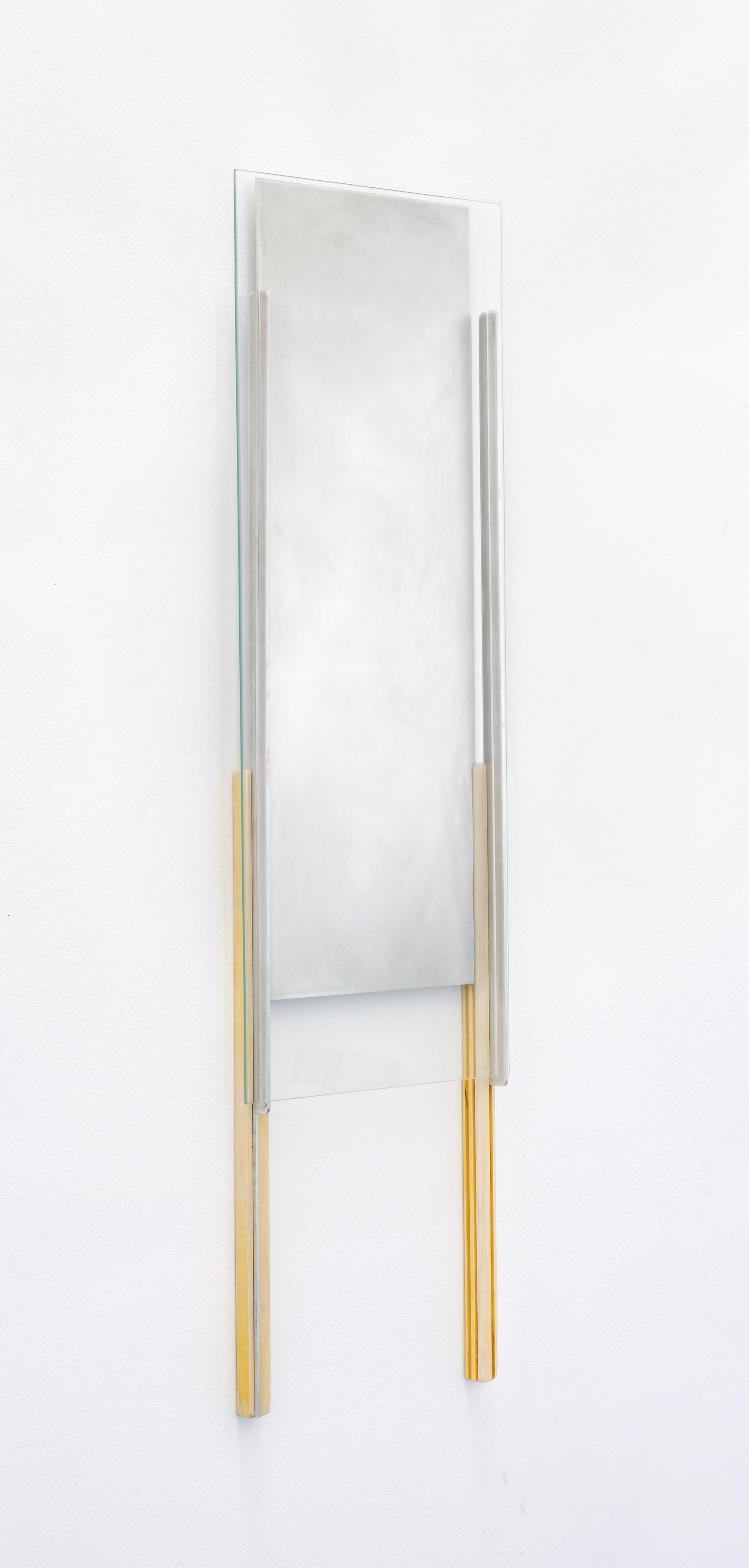  Elizabeth Orr,  Turning Familiar,  2020, 38" H x 11" W x 2" D, Aluminum, turmeric, wood, glass 