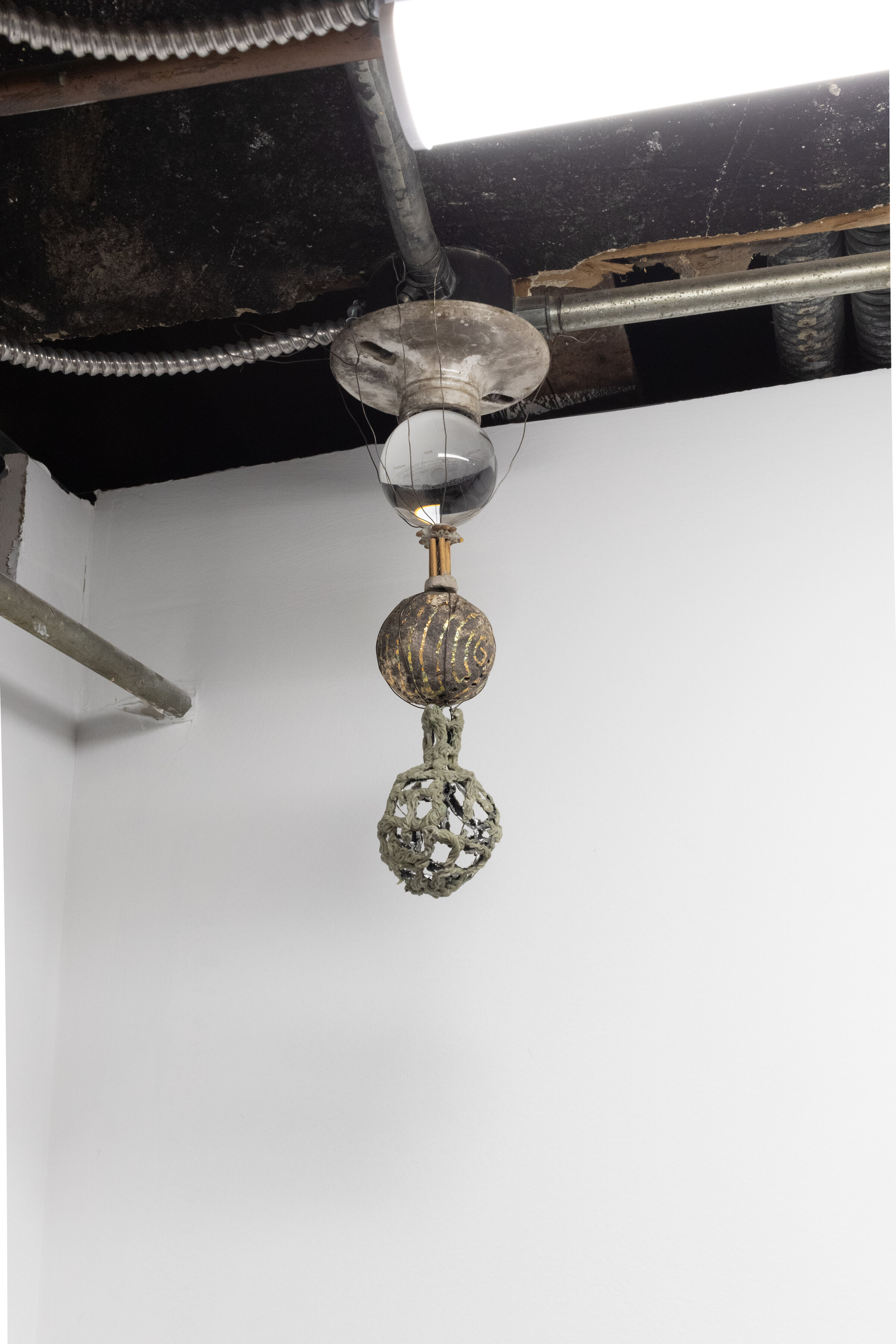   Two Orbs , glass ball with laser-engraved solar system, skewers, card and toilet paper pulp, epoxy clay, lentils, paper pulp, wire, acrylics, metal leaf.  