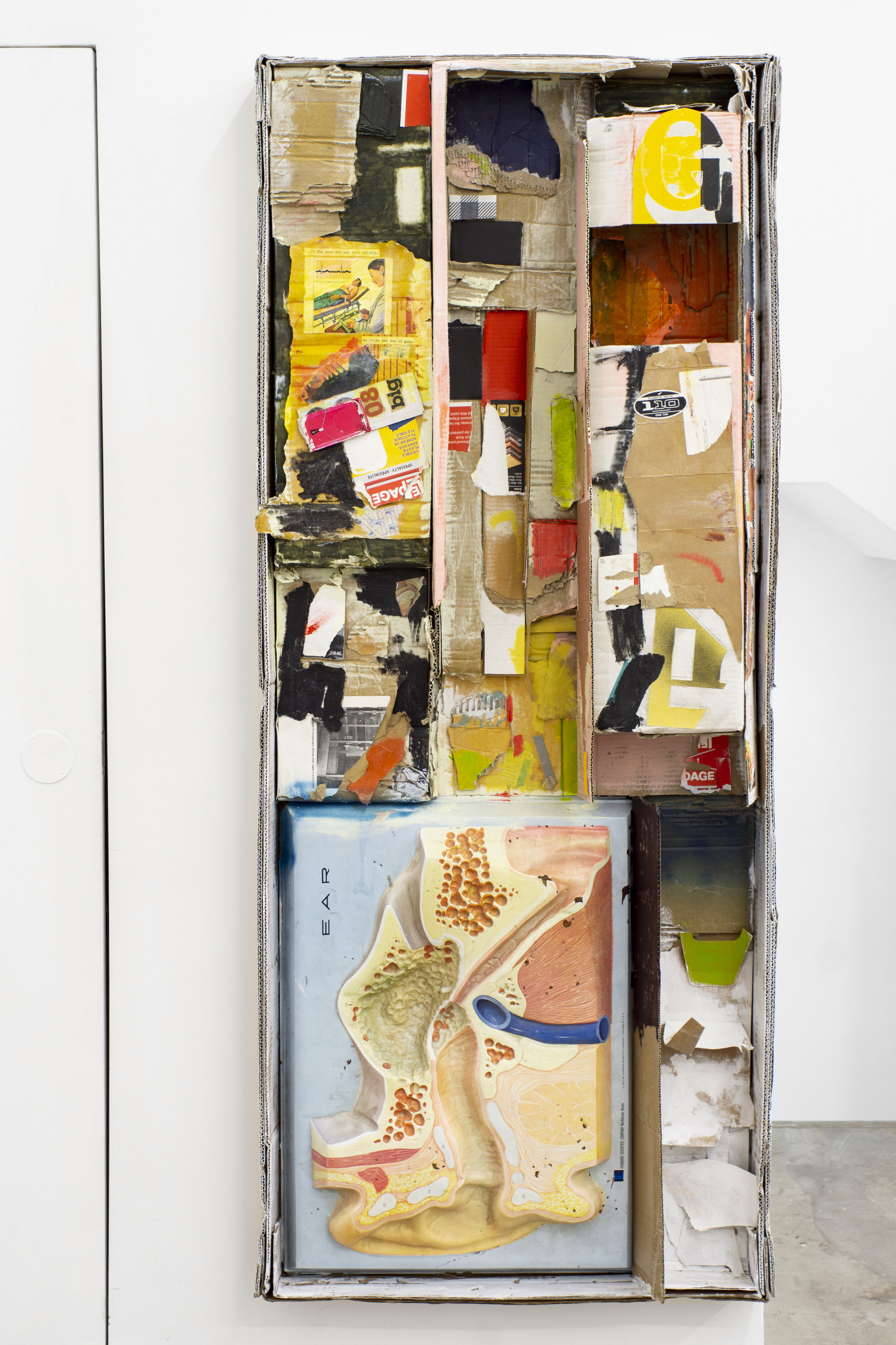  Georgia Dickie,  Grease she who see you , 2020  Mixed media collage, cardboard, and found objects 60.6 x 25.6 x 5.9 in (153.9 x 65 x 15 cm)  