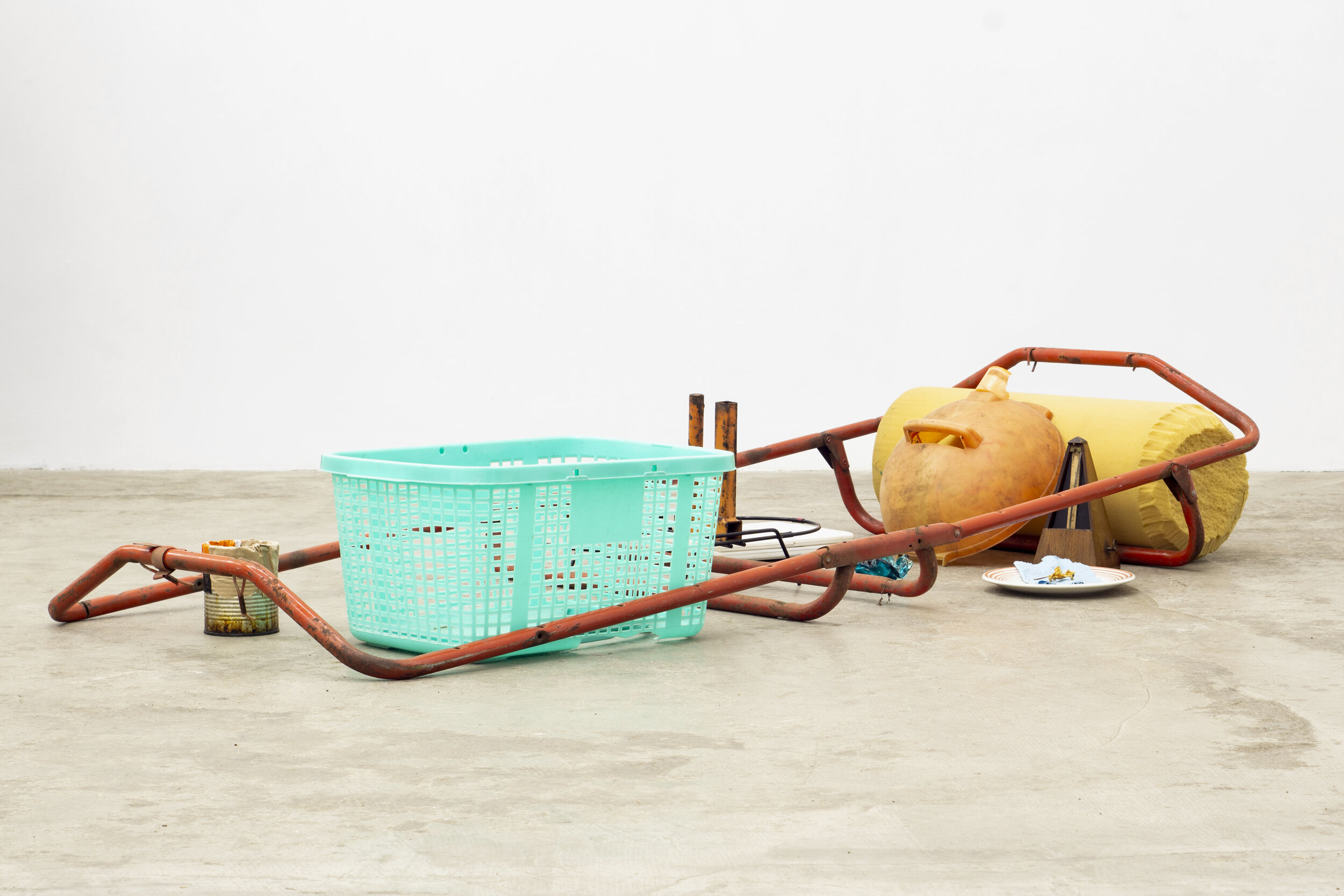  Georgia Dickie,  Privet , 2021, Found objects, metal, ceramic plate, shop towel, apple core, paper bag, plastic bin, plastic bag, metronome, foam, and glue  Dimensions variable   