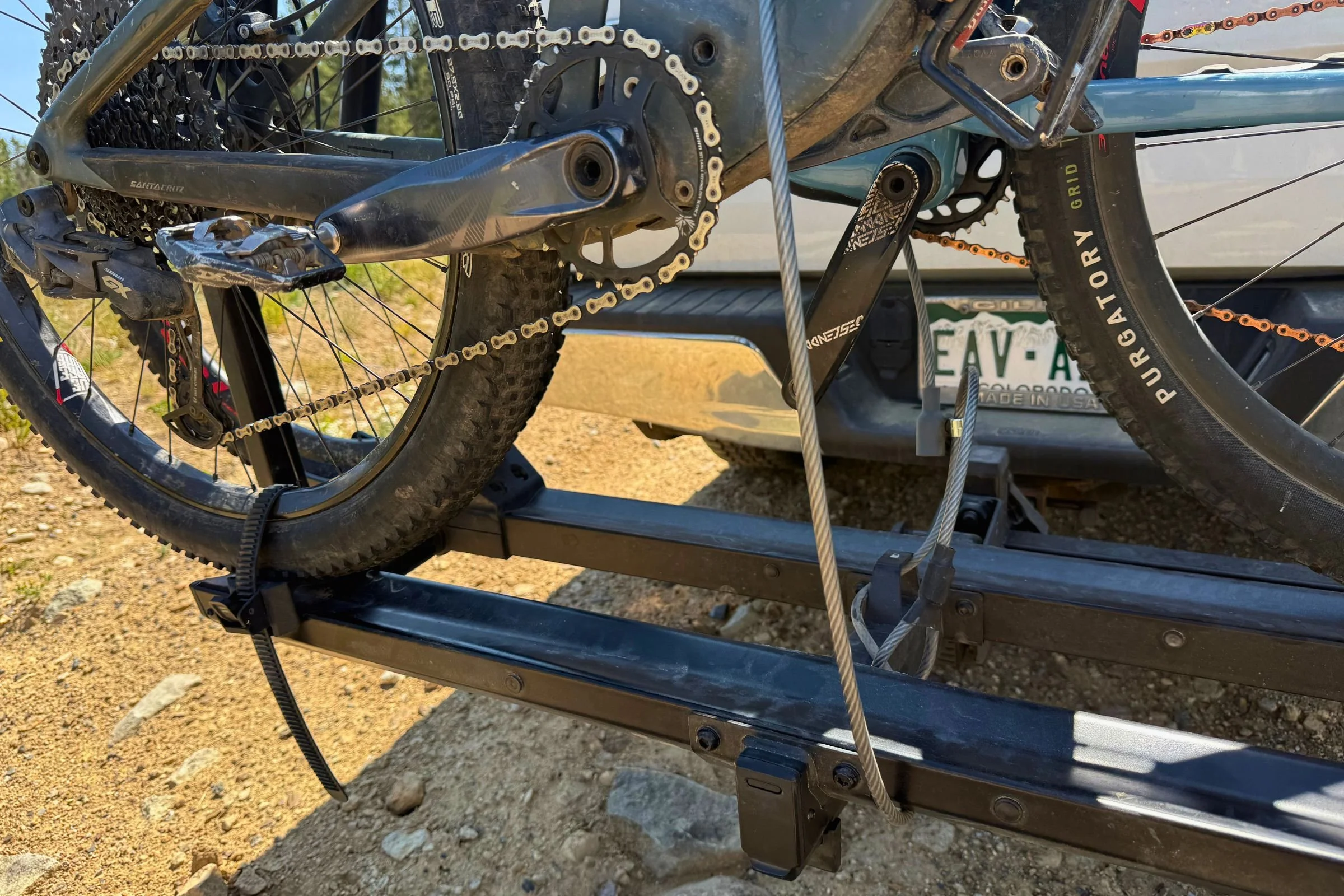 Bicycle secured with integrated locks on the Yakima StepUp Swing 2” Hitch Bike Rack.