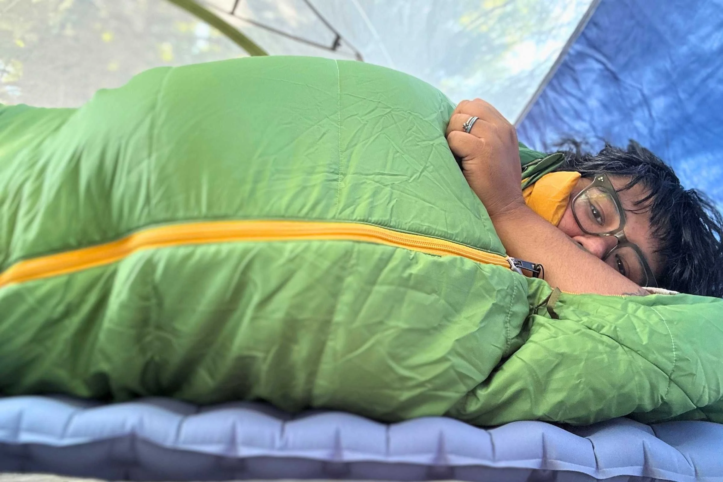 The author in the REI Trailmade sleeping bag.