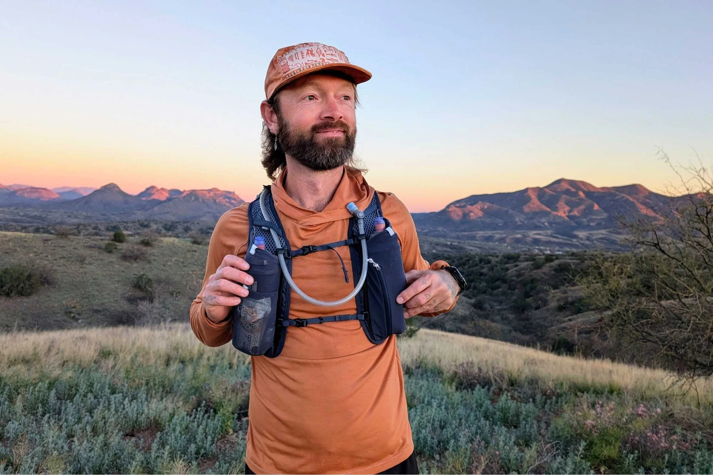 The front vest pockets have room for two soft flask bottles, a phone, and snacks.
