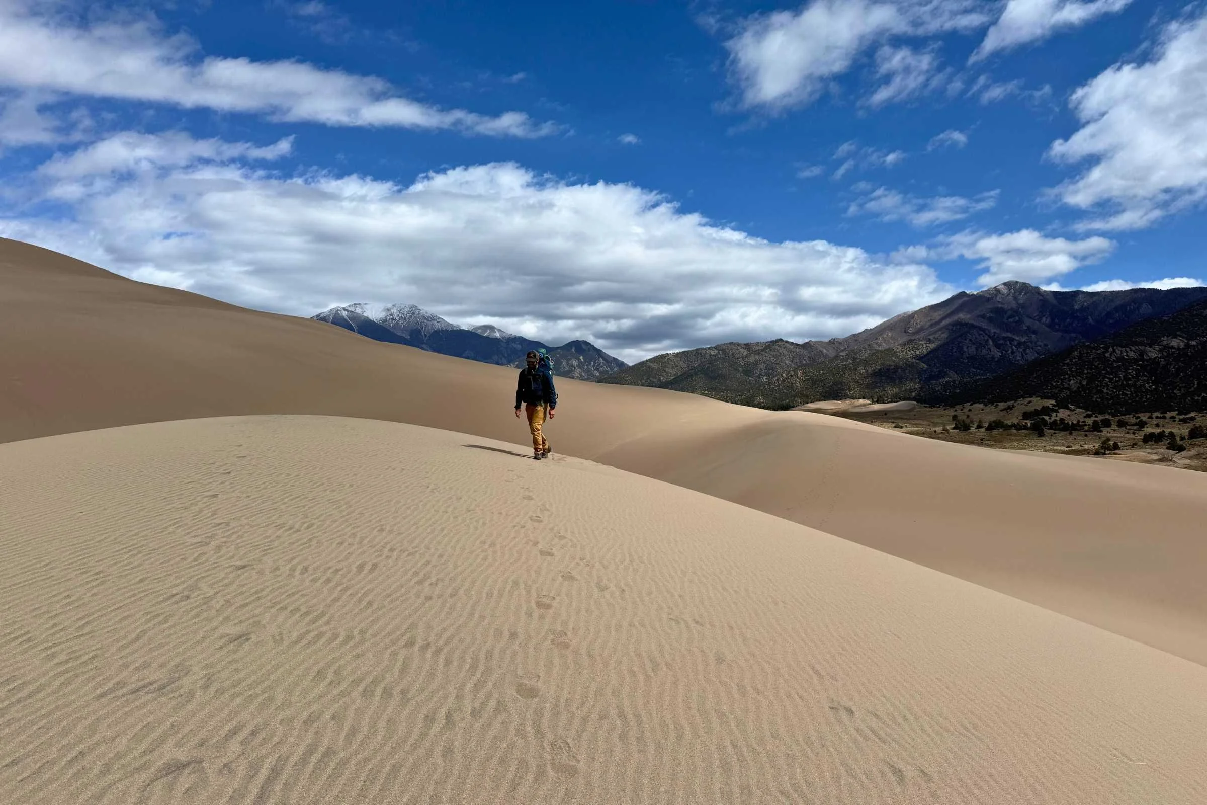 Testing the men’s Gamma hoody in Great Sand Dunes National Park on a cool and windy spring day. Photo by Stasia Stockwell.