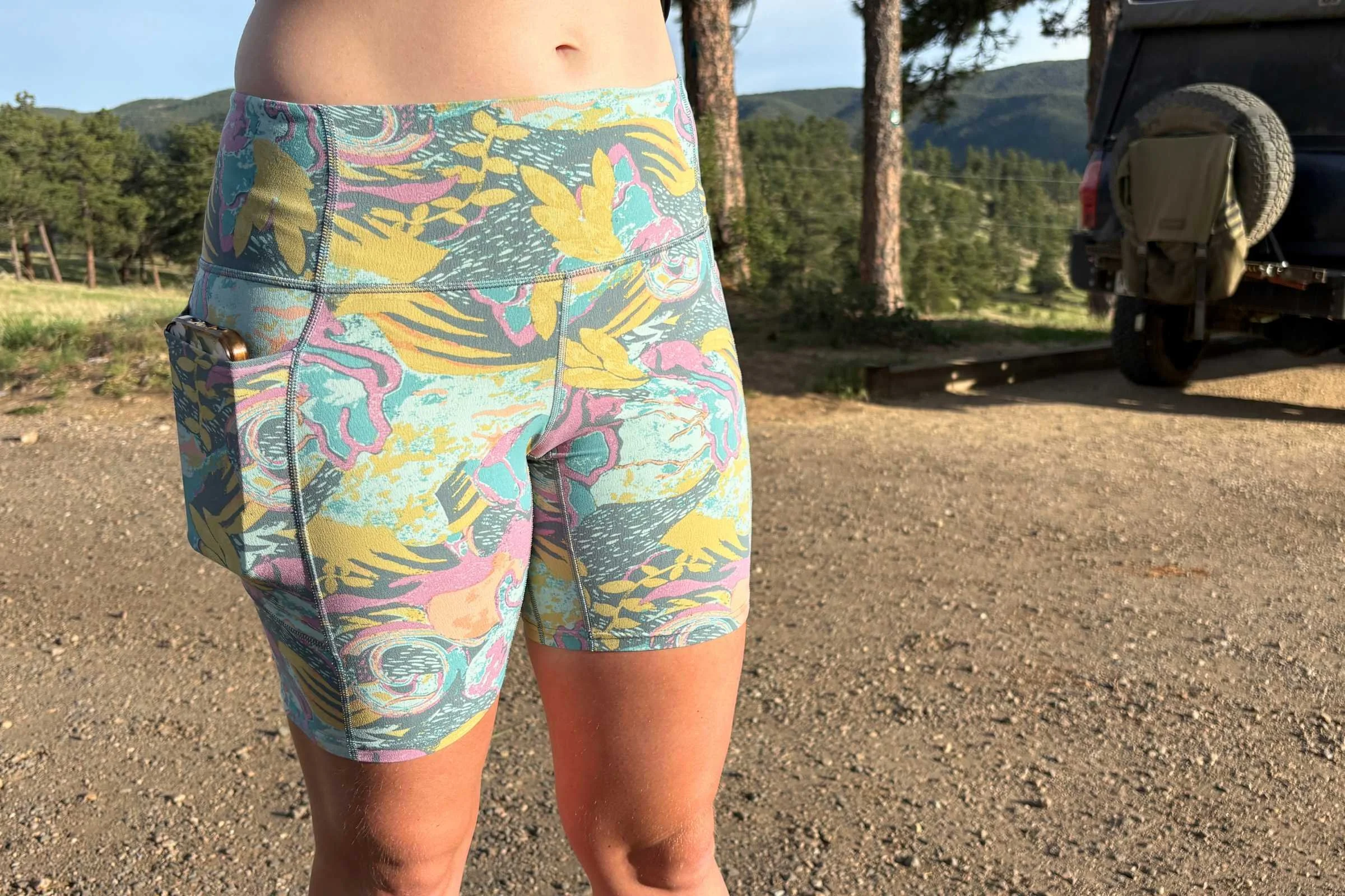 A person wearing patterned Patagonia Maipo Shorts
