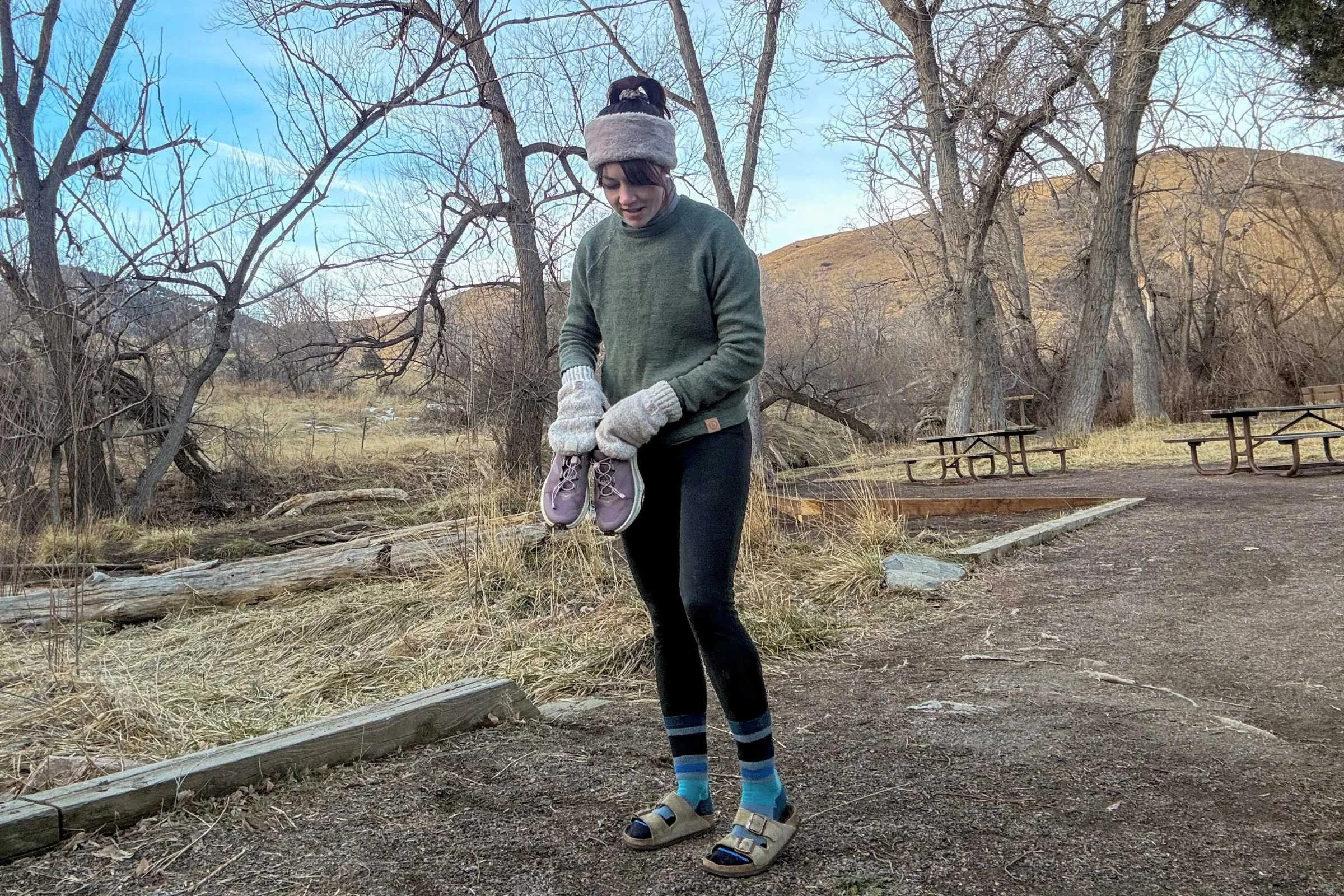 person wearing birkenstock arizona sandals at a picnic site