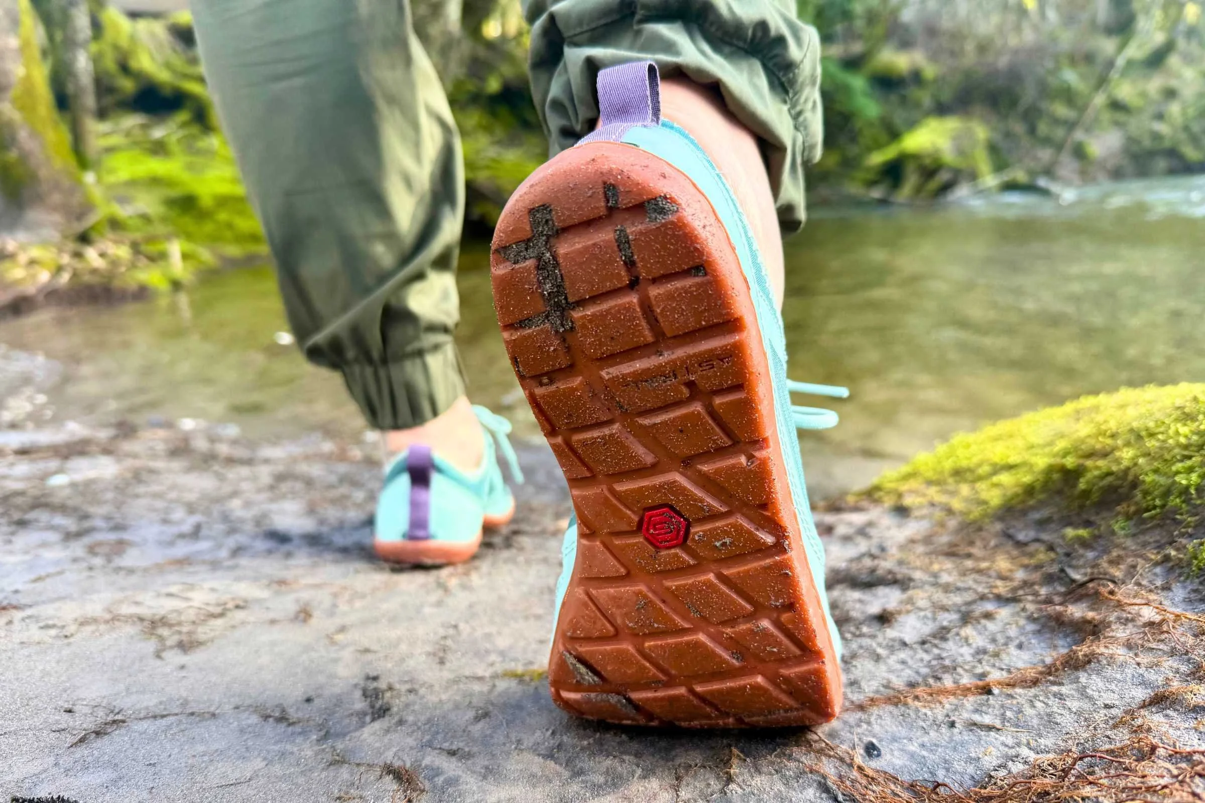 Sticky G-RUBBER outsole gripping slick river rock during wet wading. Photo by Steve Redmond