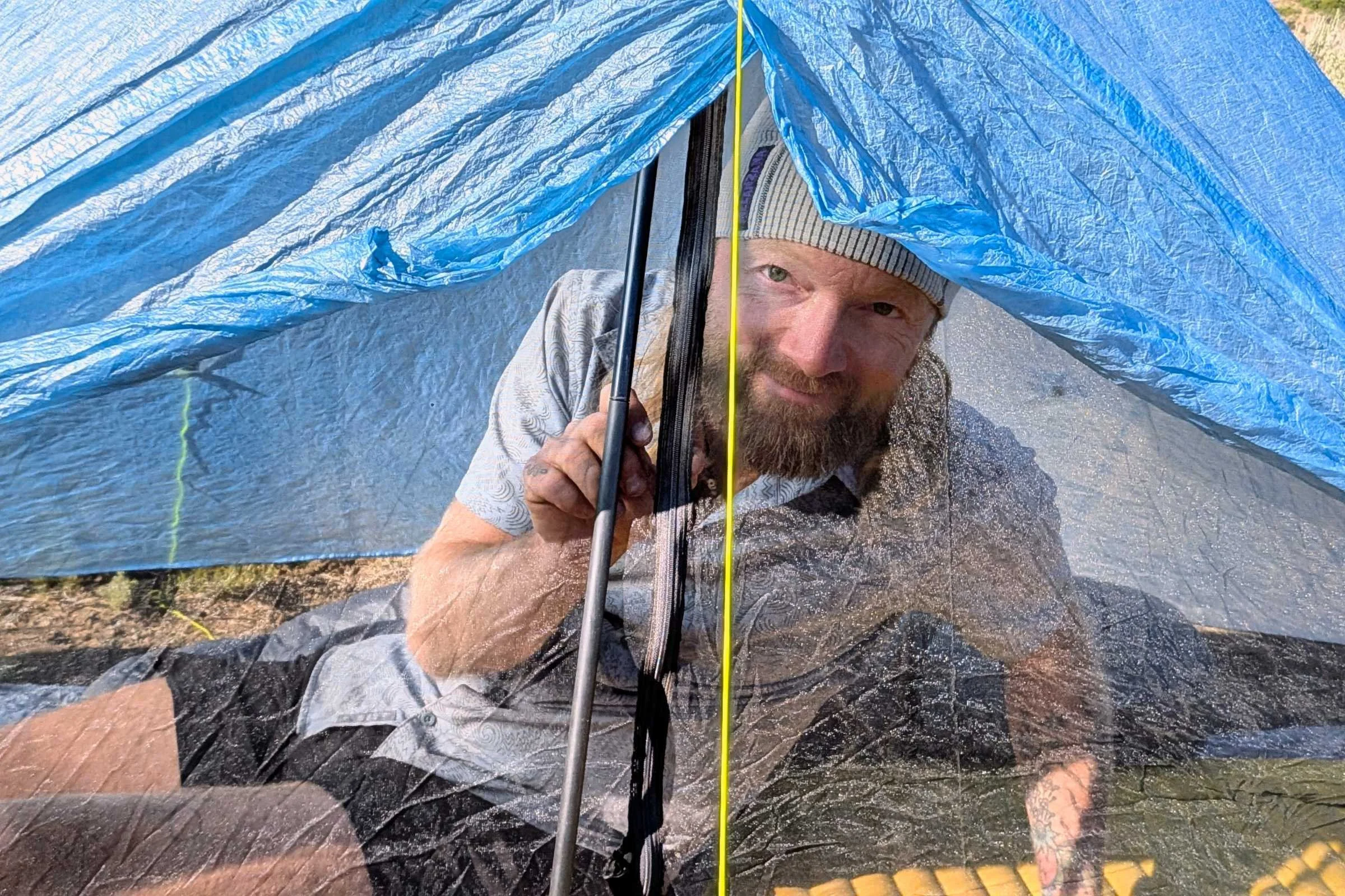 Author sitting inside Zpacks Hexamid Ultralight Tent