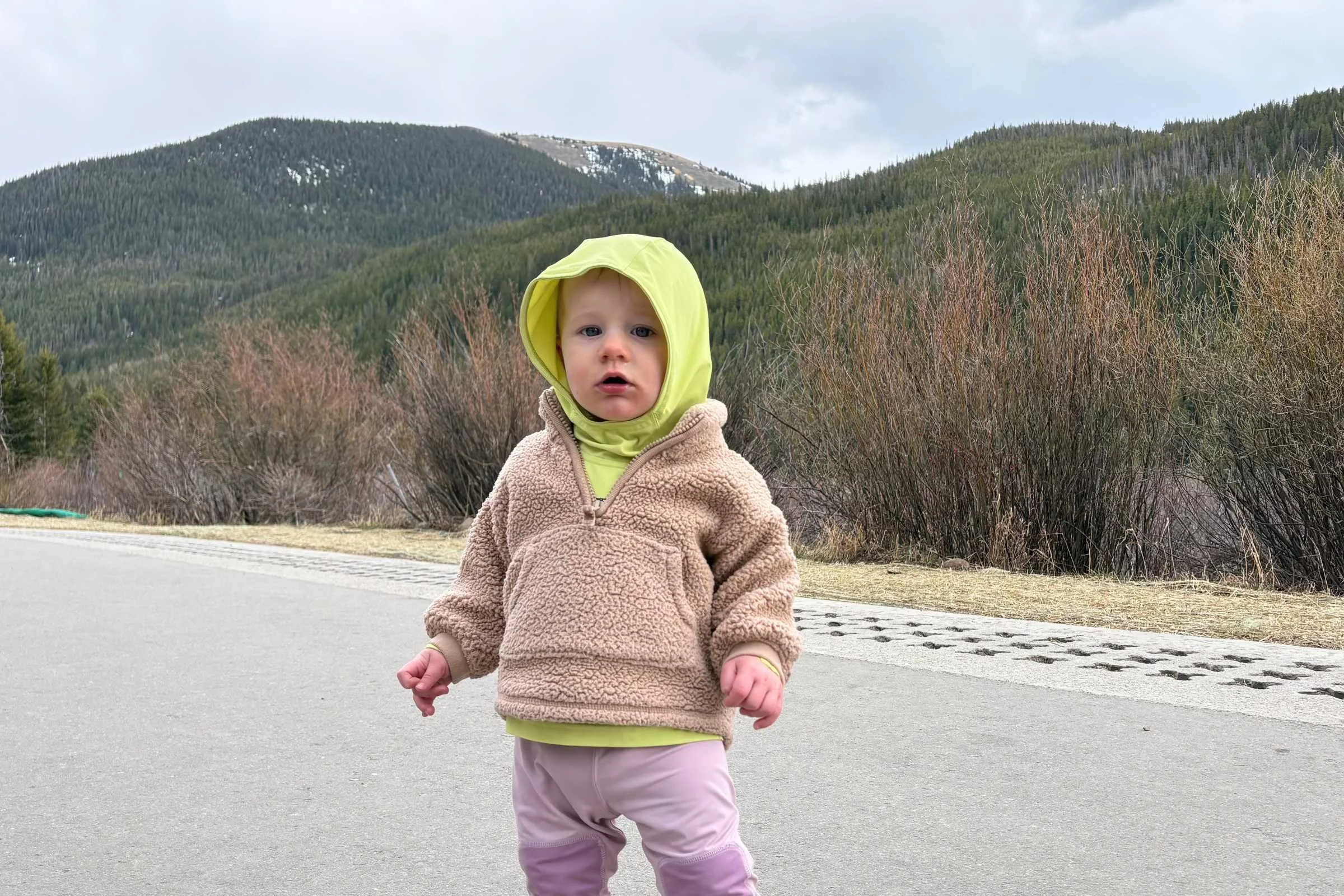 Erica’s daughter AJ wearing the Patagonia Baby Capilene Silkweight Hoody for sun protection in the mountains. Photo courtesy Erica Zazo