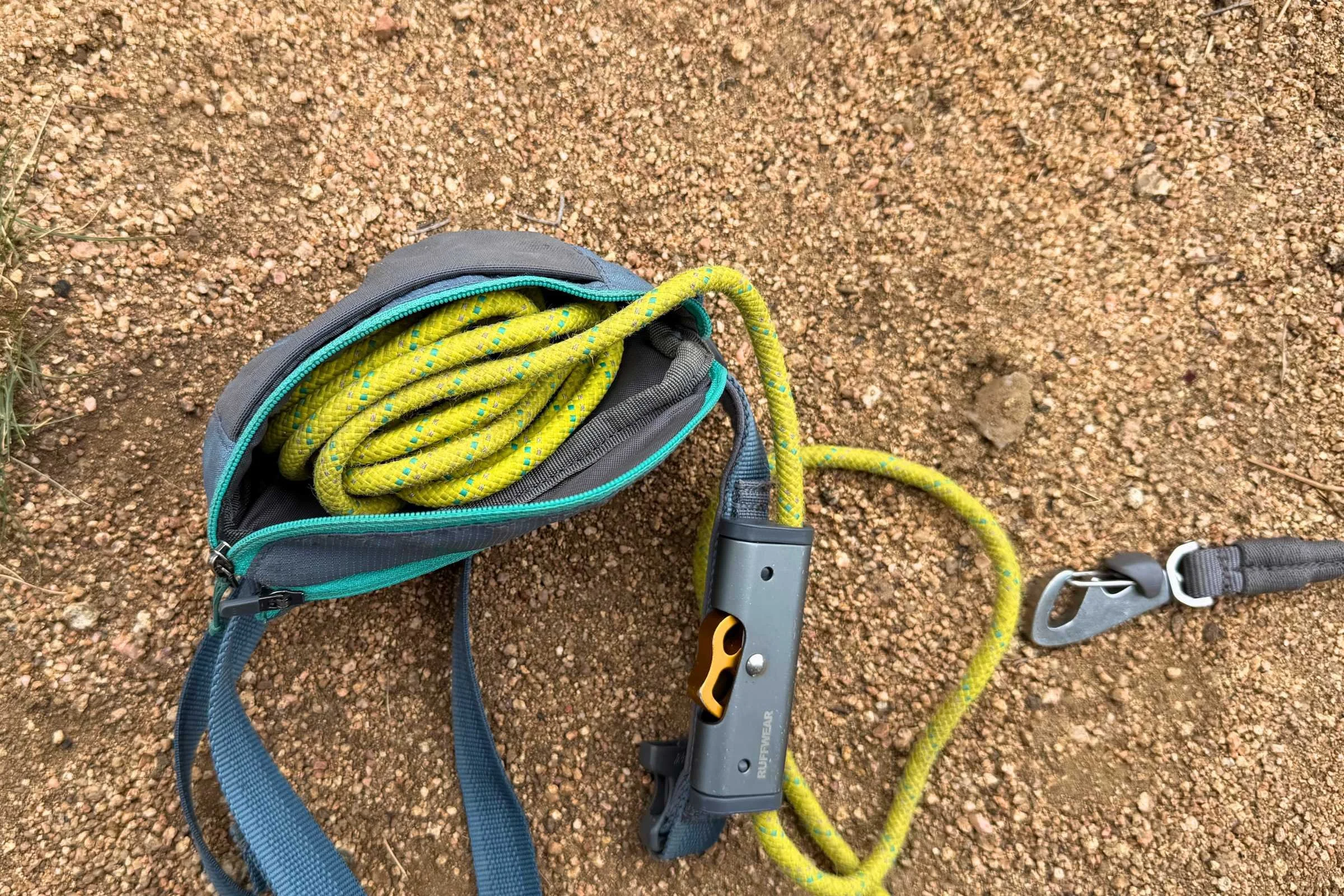 Close up of Ruffwear hands-free rope leash and the stow pouch that comes attached to it