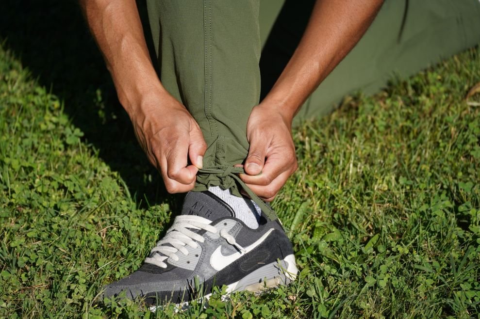 A close-up of the ankle drawstring on the Coalatree Trailhead pants