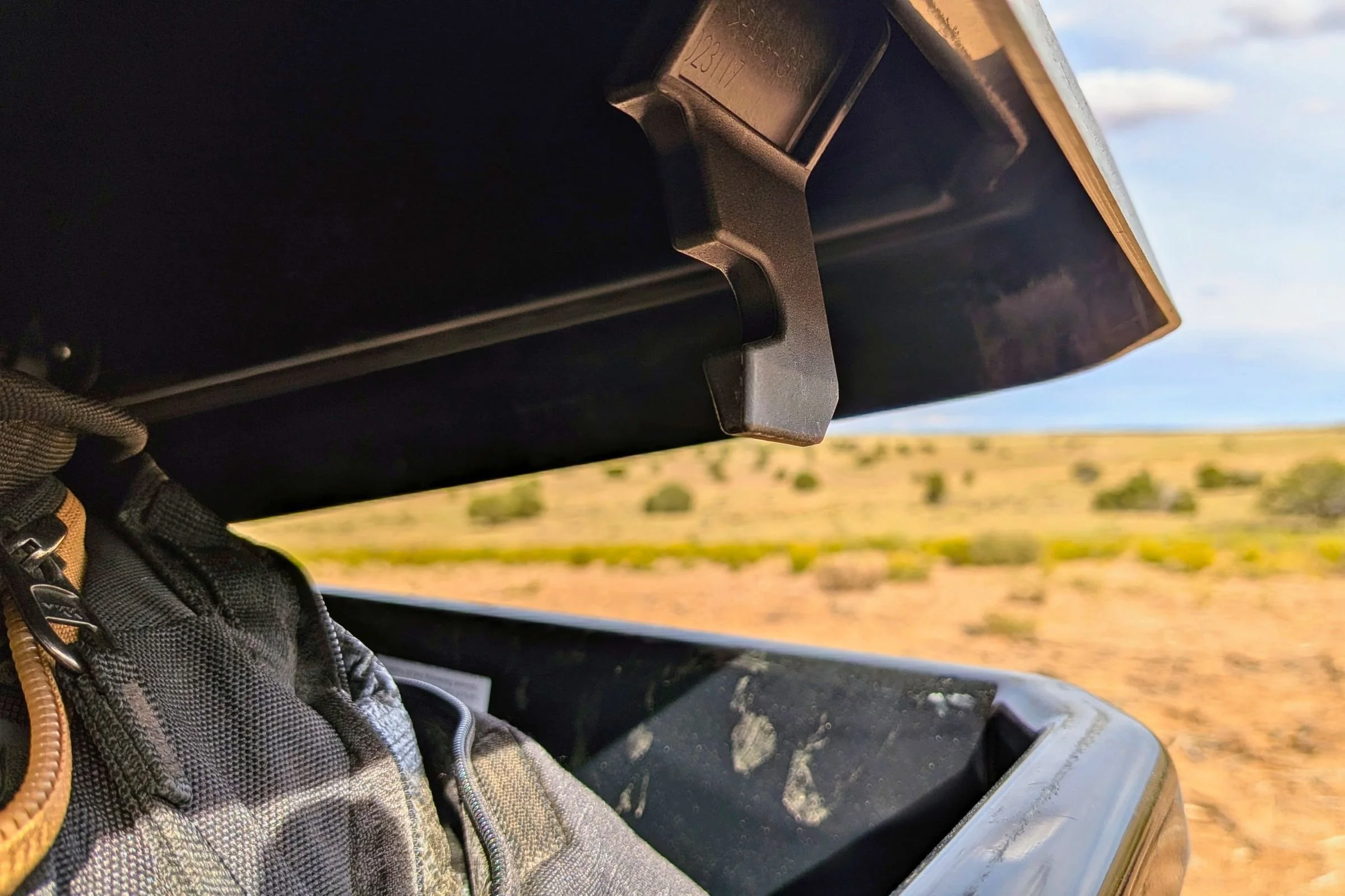 Close-up of the lid latch inside an open Yakima EXO GearLocker.