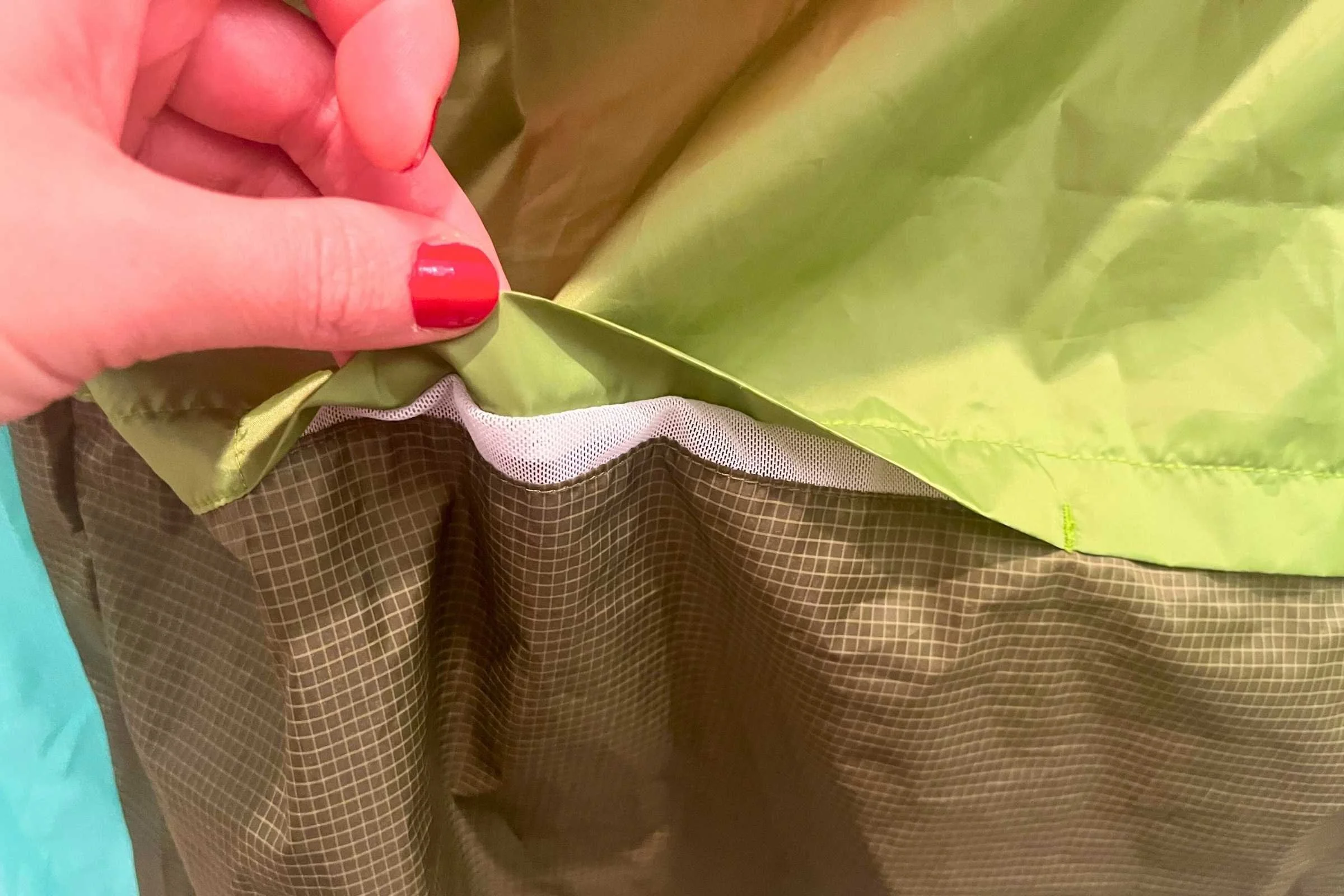 Venting on the Cotopaxi Teca Windshirt involves panels with large openings of mesh.