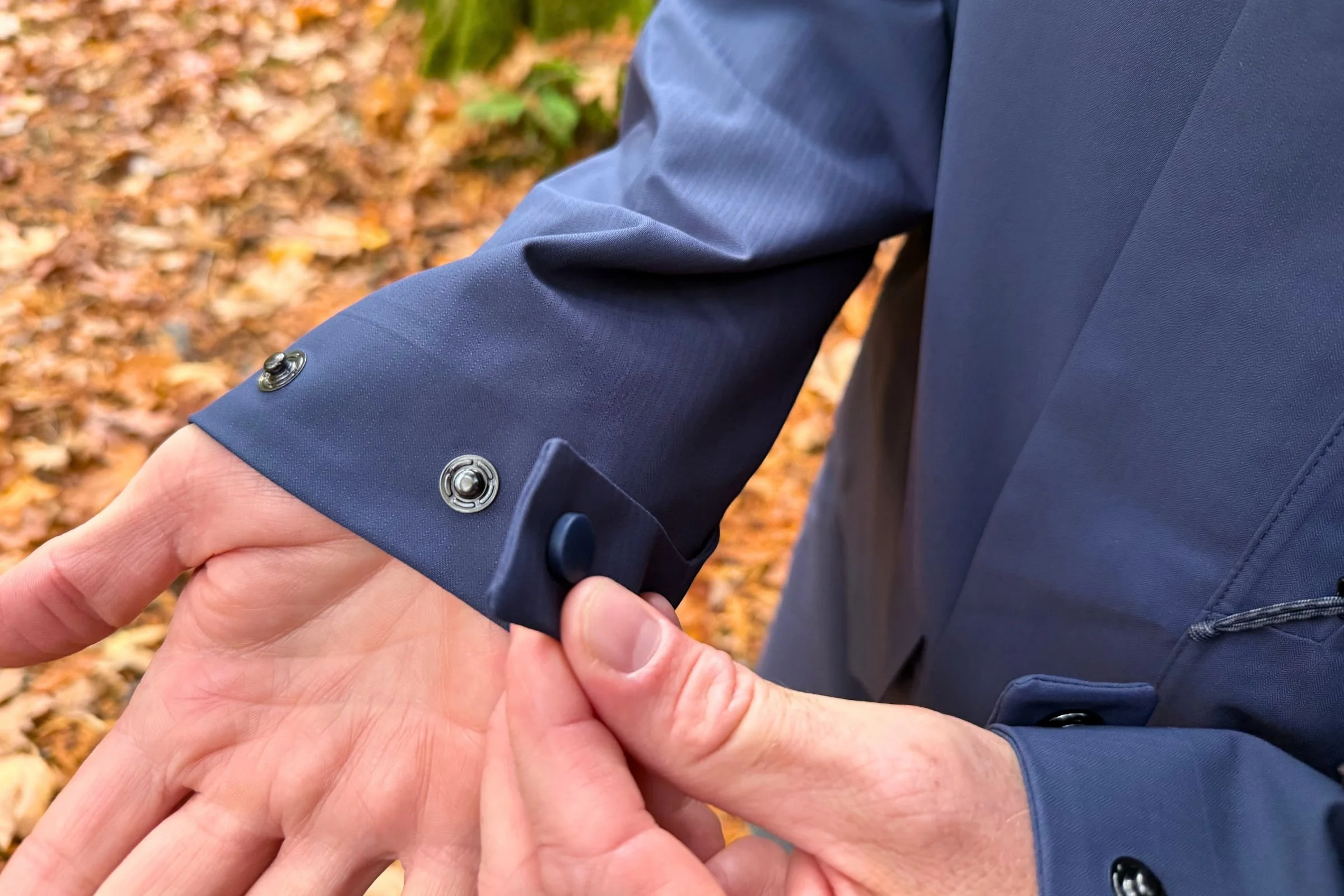 The men’s cuffs adjust with snaps (the women’s cuffs have a zipper).