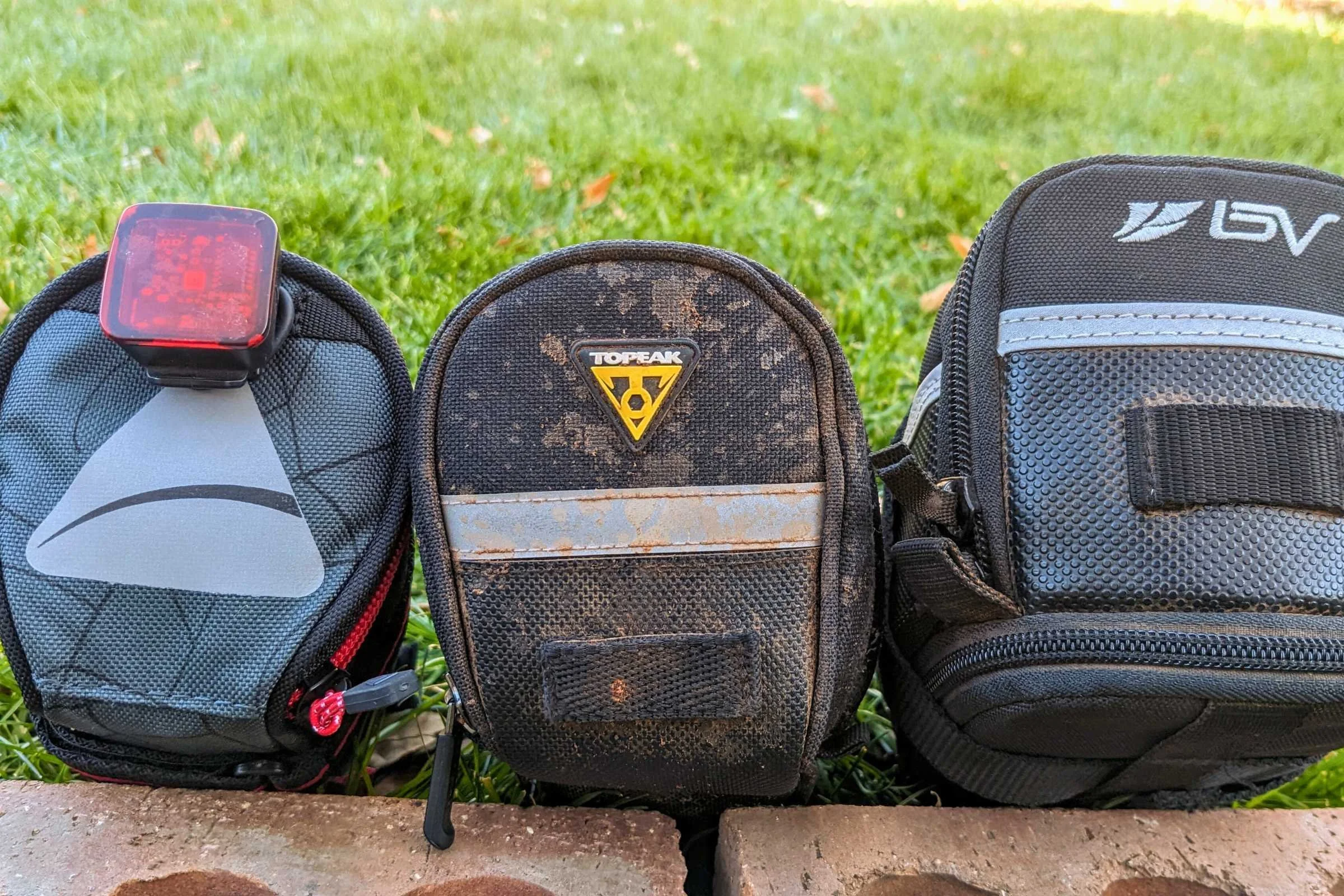 Road cycling bike seat bags are the smallest bike bags, but still need enough capacity to carry essentials like a spare tube and multitool.