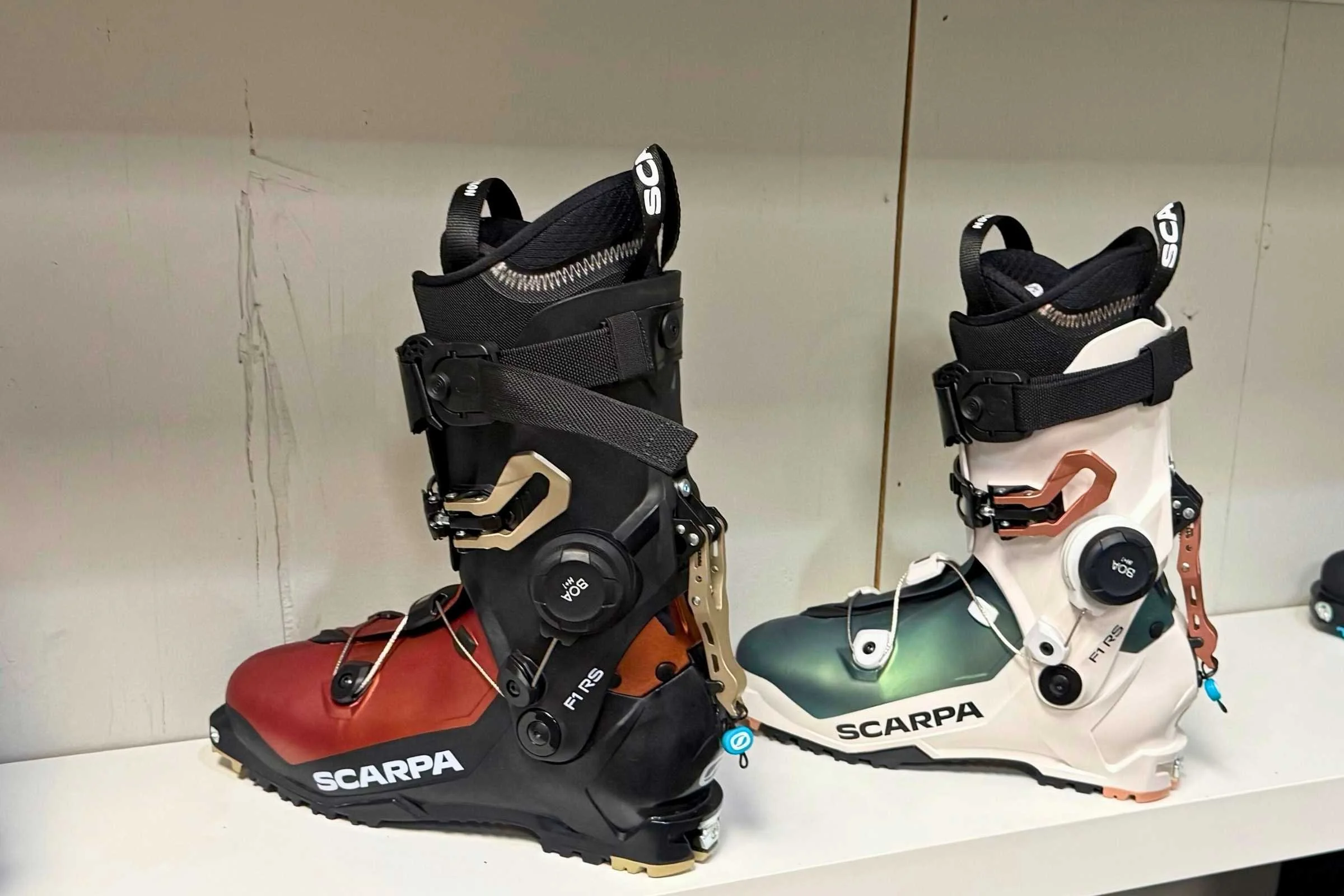 Two colorways of the upcoming SCARPA F1 RS backcountry touring ski boot, designed to offer increased stiffness while remaining lightweight for ski touring.