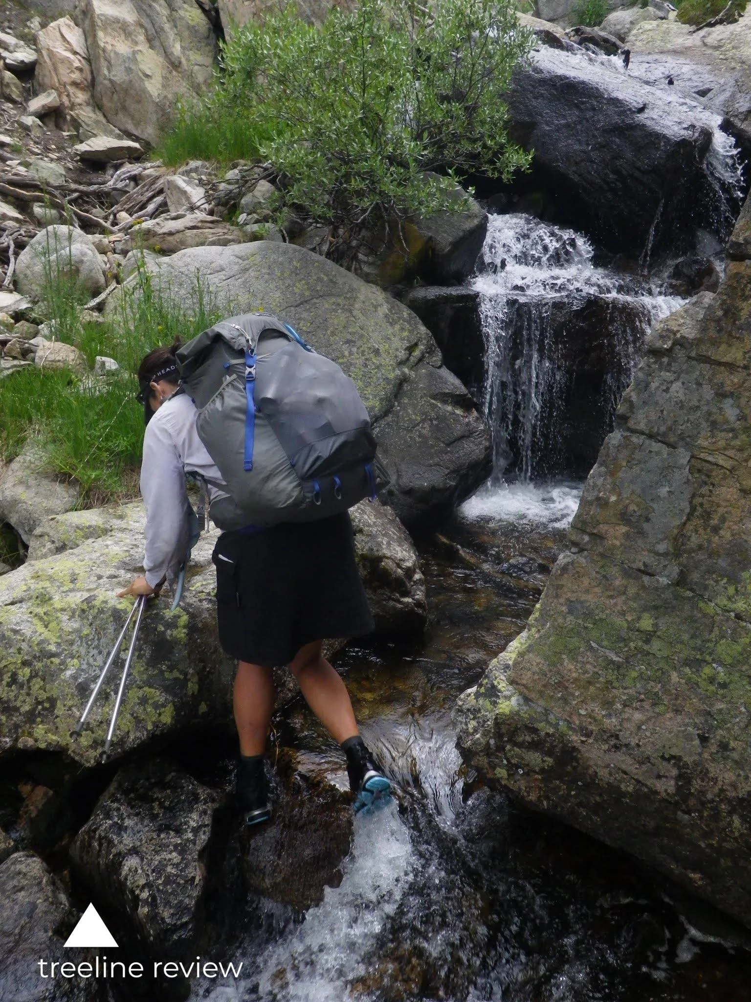 The Mariposa has trekking pole and ice axe attachment loops on the bottom. The stretchy mesh can fit many items you may want to easily access throughout the day, like snacks. Photo by Liz Thomas