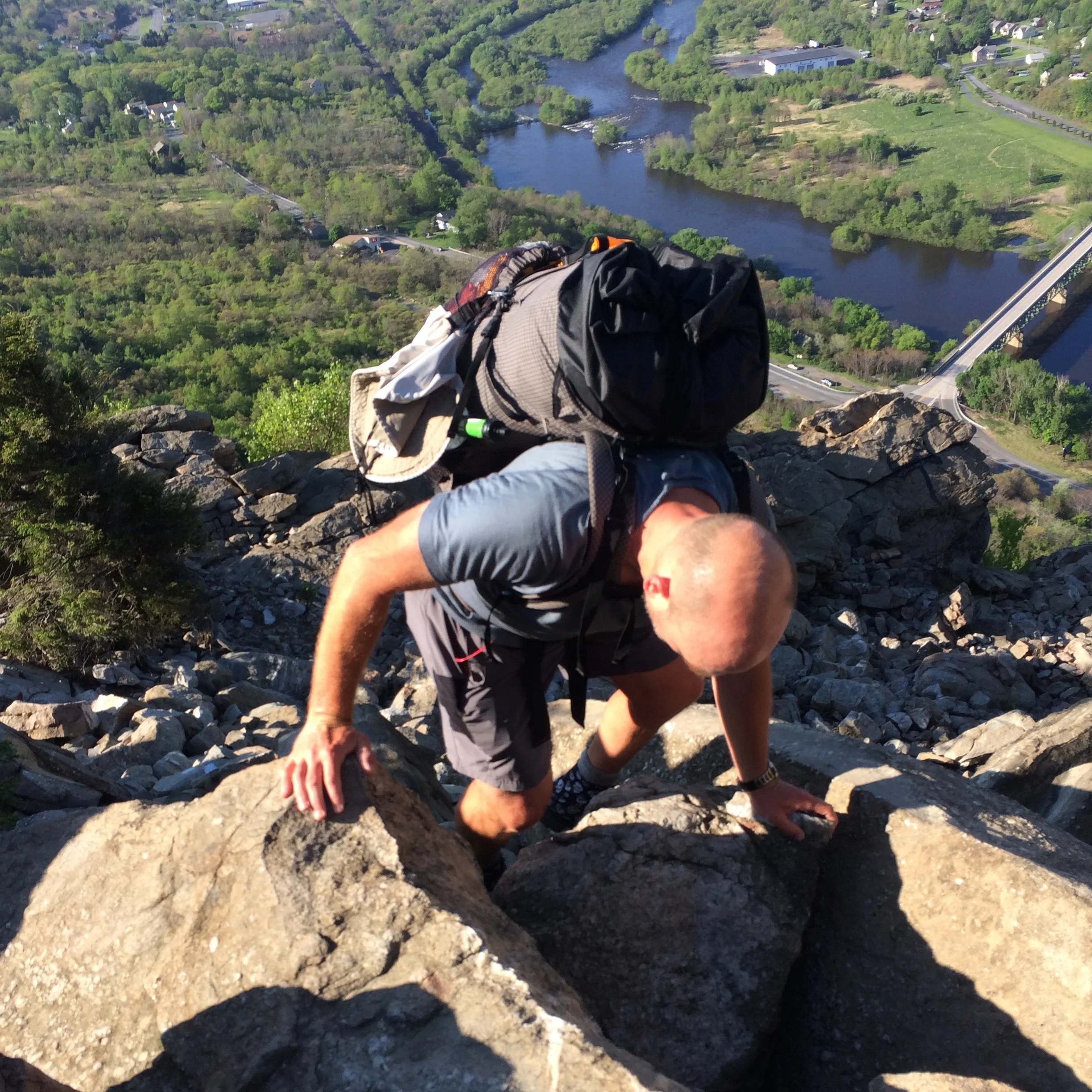 The author scrambling unsteady boulders on the Appalachian Trail near Lehigh Gap with the MLD Exodus. Photo by Naomi Hudetz.
