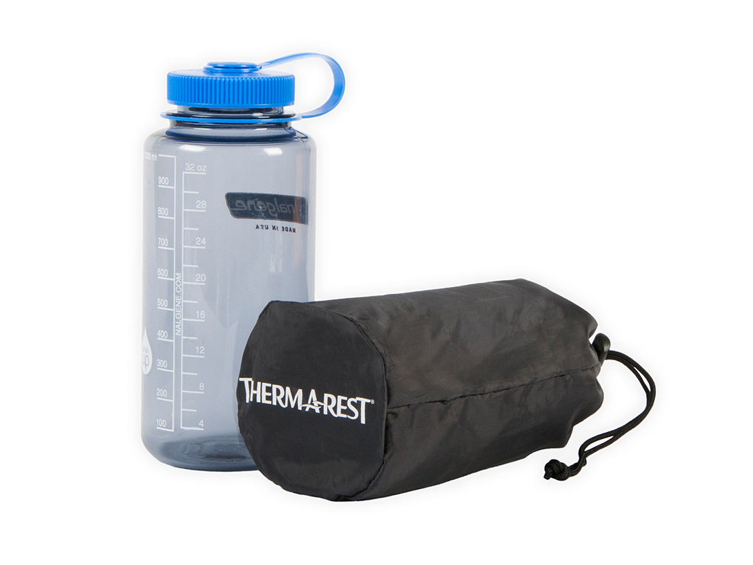 The Therm-a-Rest NeoAir XLite packs down to the size of a one liter Nalgene water bottle.