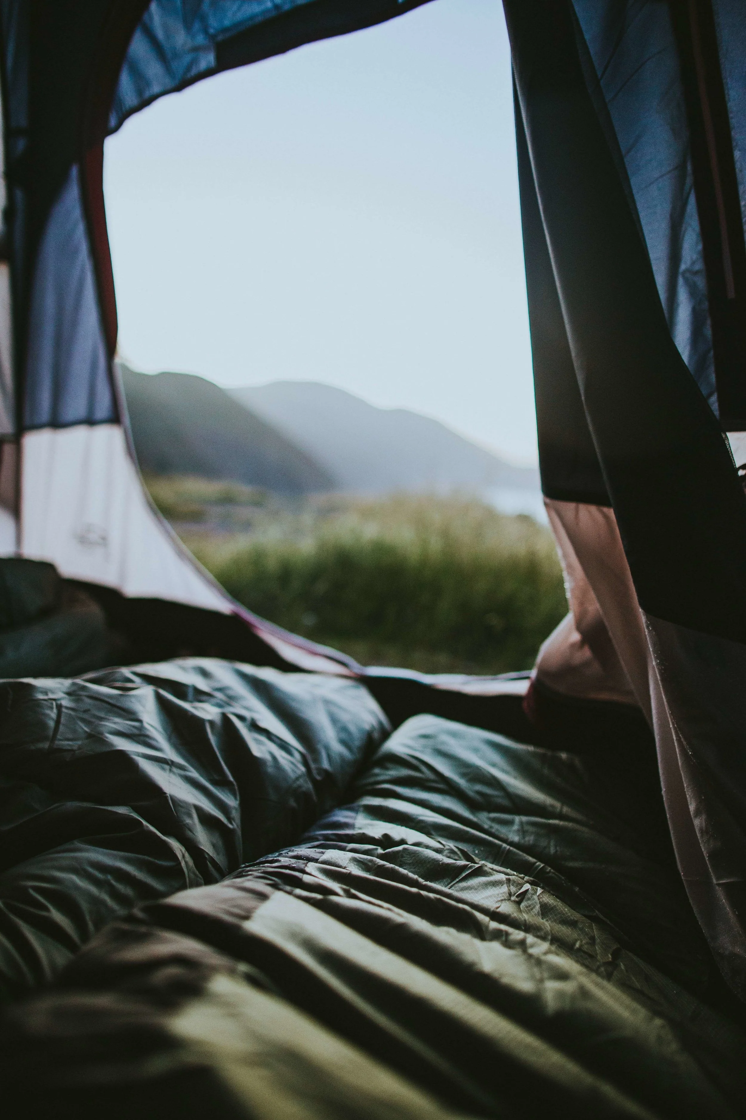 Your camping tent should feel cozy inside, even if it’s cold and raining outside. Photo by Ivana Cajina on Unsplash