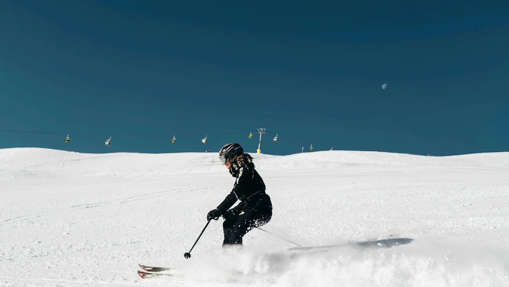 Goggles are one of the first pieces of gear skiers should invest in because they touch your face. Photo by Valentin B. Kremer on Unsplash