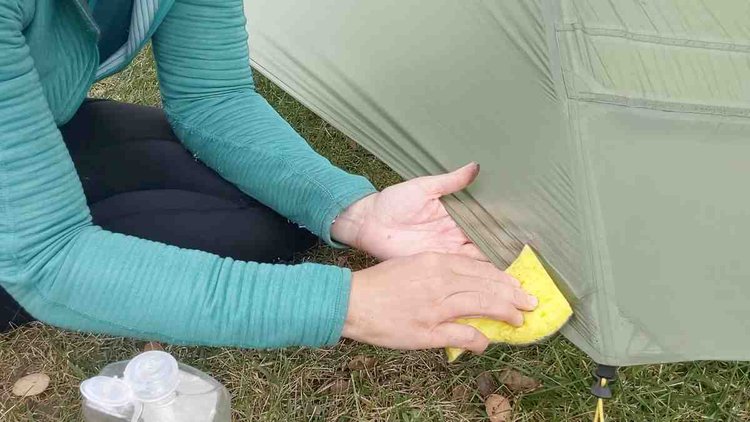 Washing a down sleeping bag with a duct tape patch - Backpacking Light