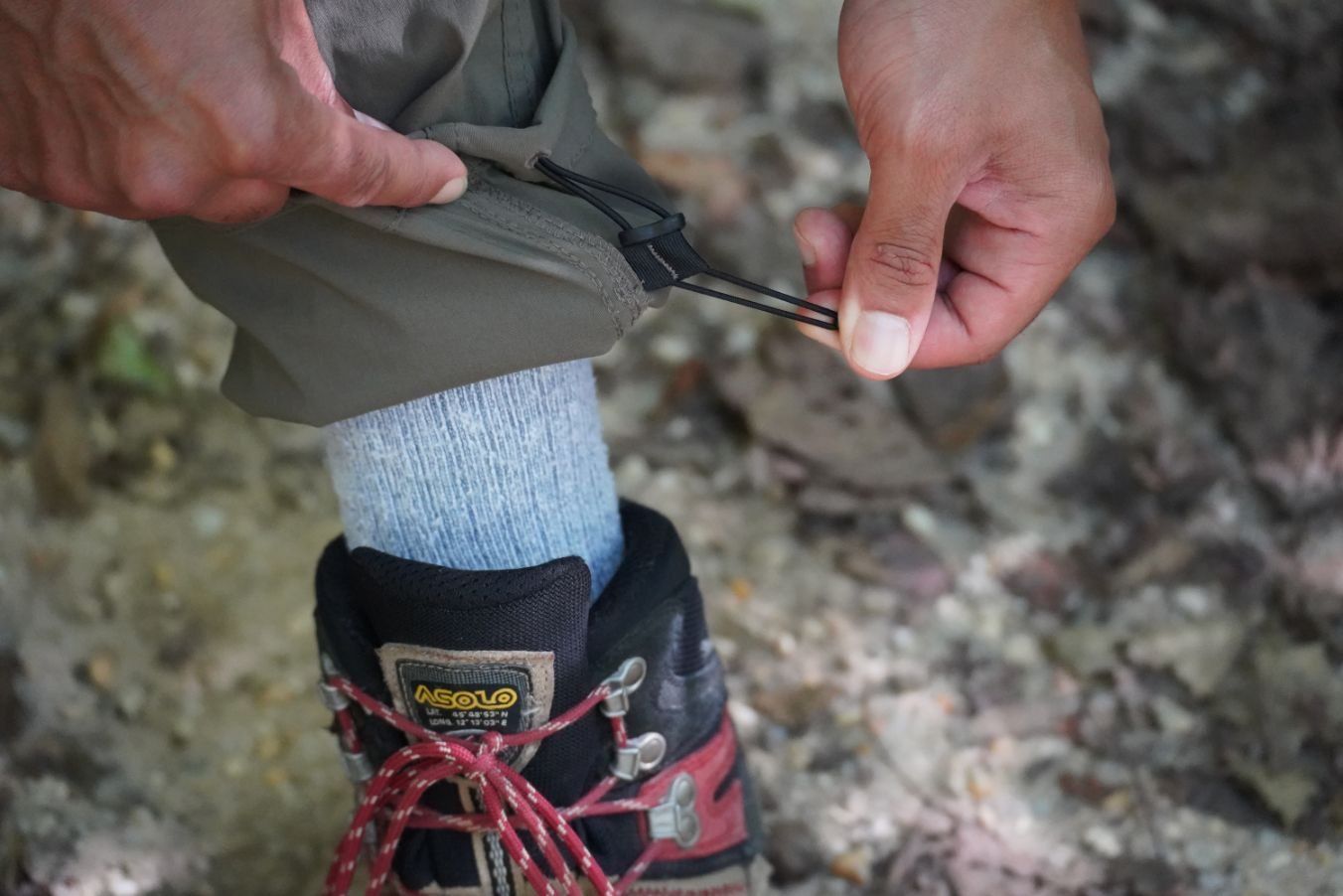 A close-up of the Kuhl Radikl hiking pants ankle tightening system
