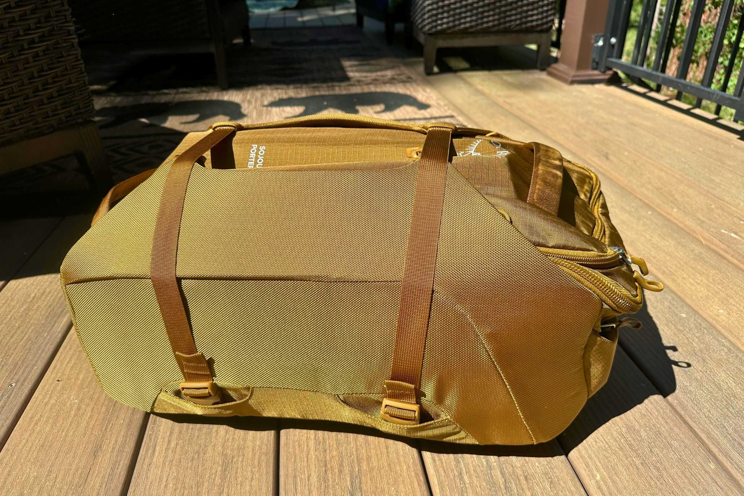 The outside straps can clip into an alternate space for a smaller load or to fit easier into a carryon bin. Photo courtesy Sara Kruglinski.