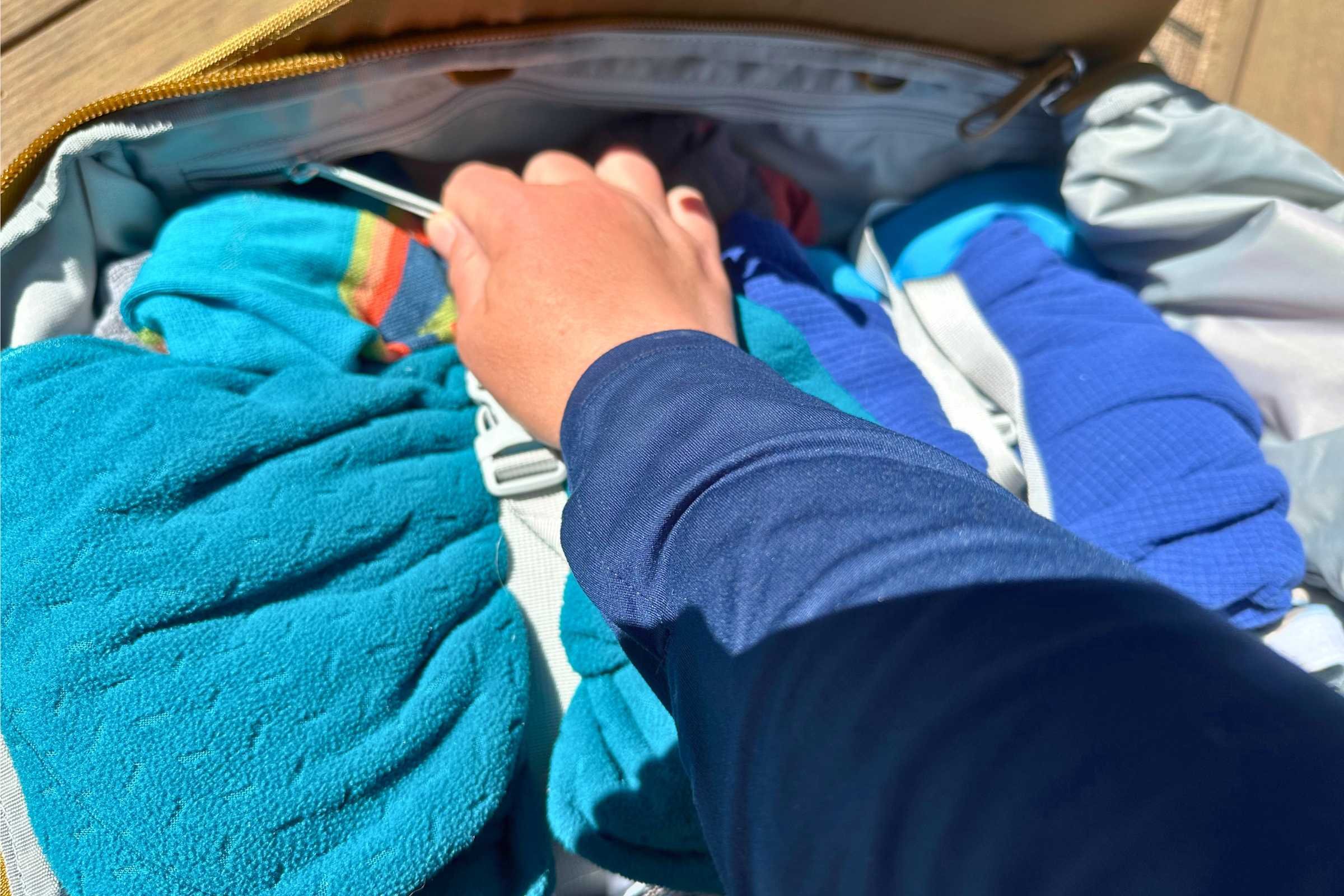 There are zippered pockets in the main compartment on both sides for delicate or smaller items. Photo Courtesy Sara Kruglinski.