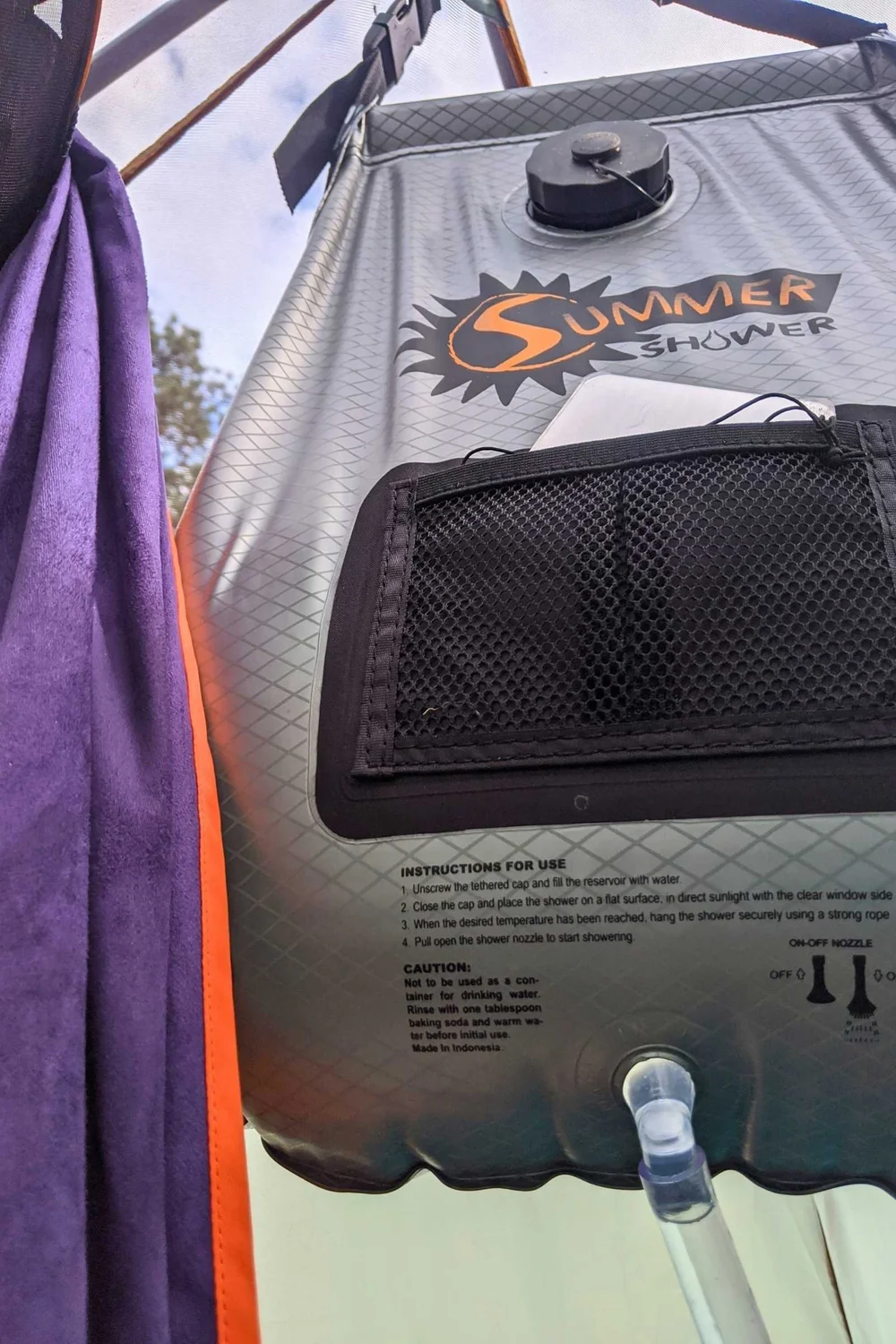 camping shower bag hanging setup carabiner