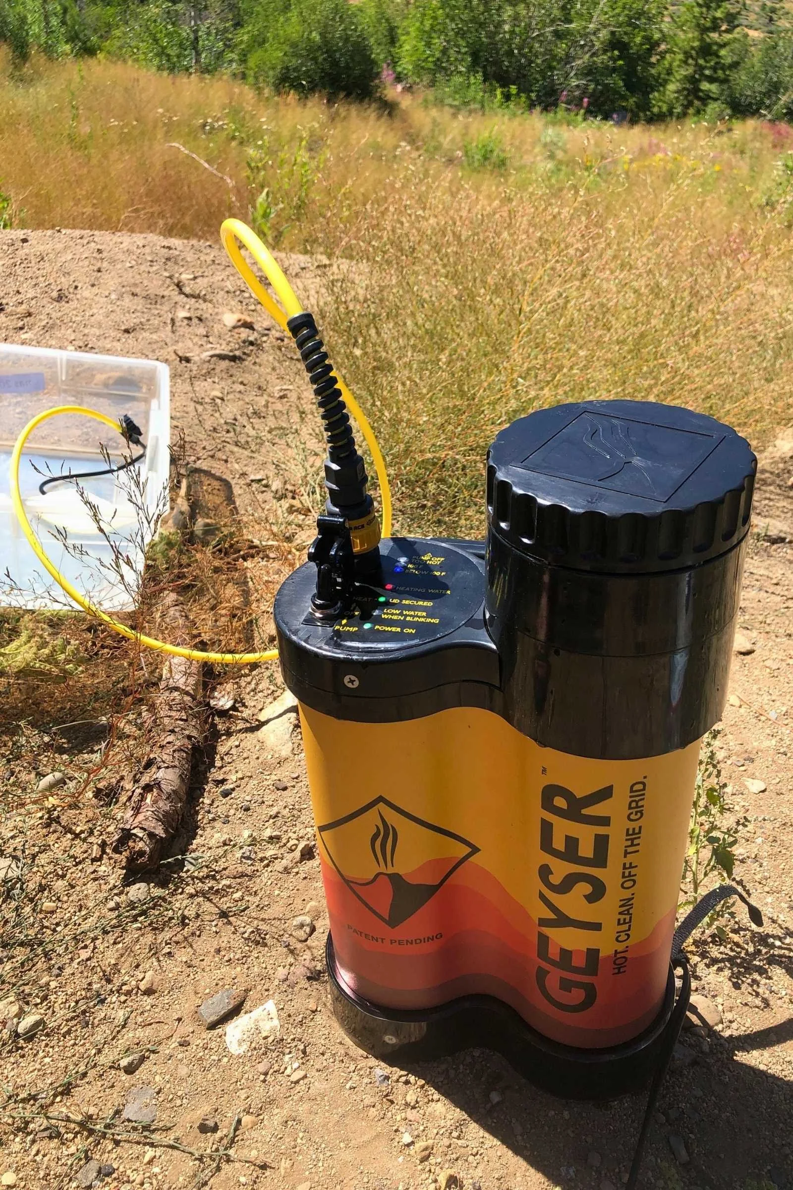 The Geyser Systems heated camp shower has lighted dials on the top that indicator when the water is hot and ready to use.