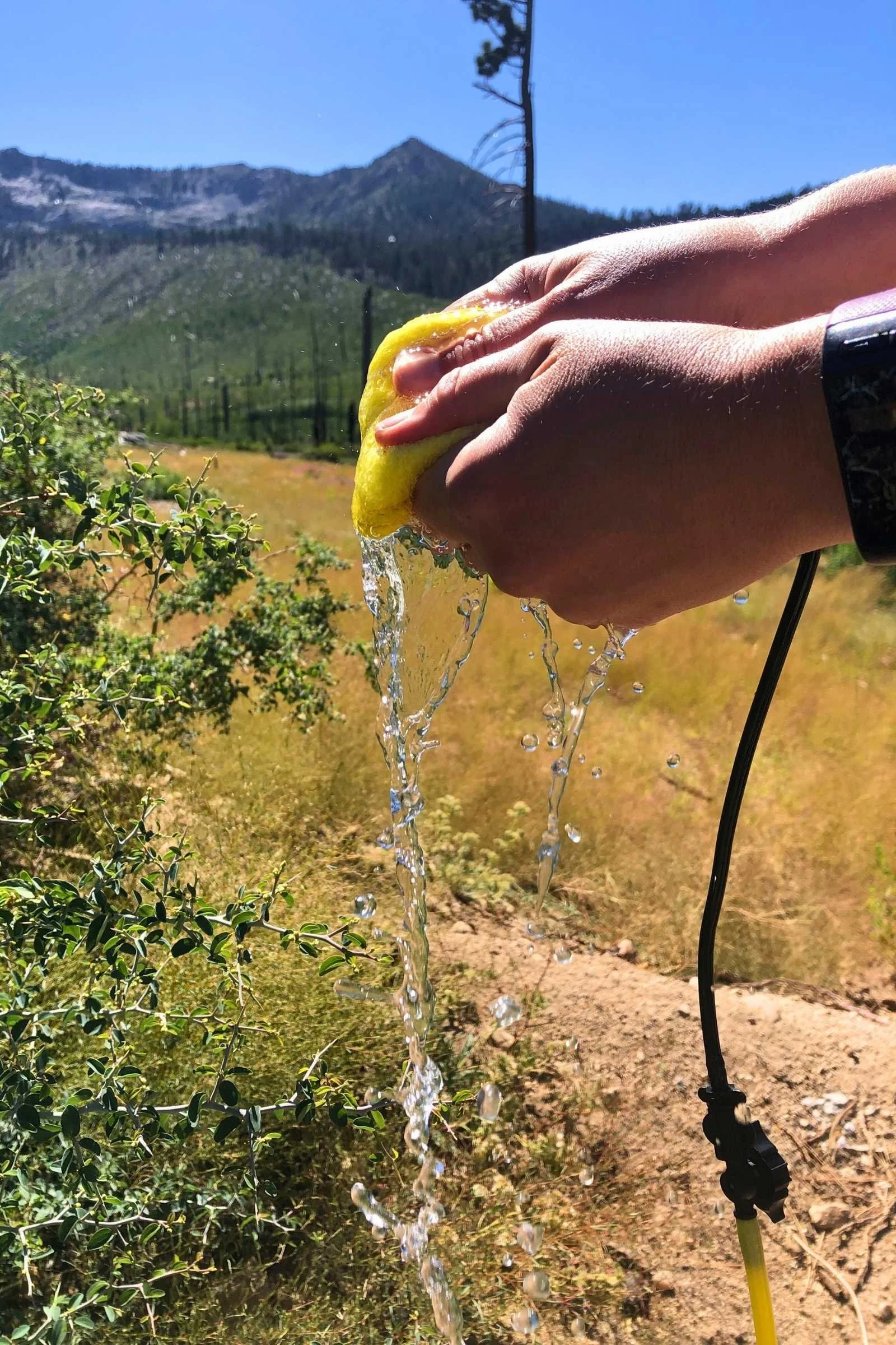 The sponge system allows you to use water more efficiently on the Geyser Systems camp shower.