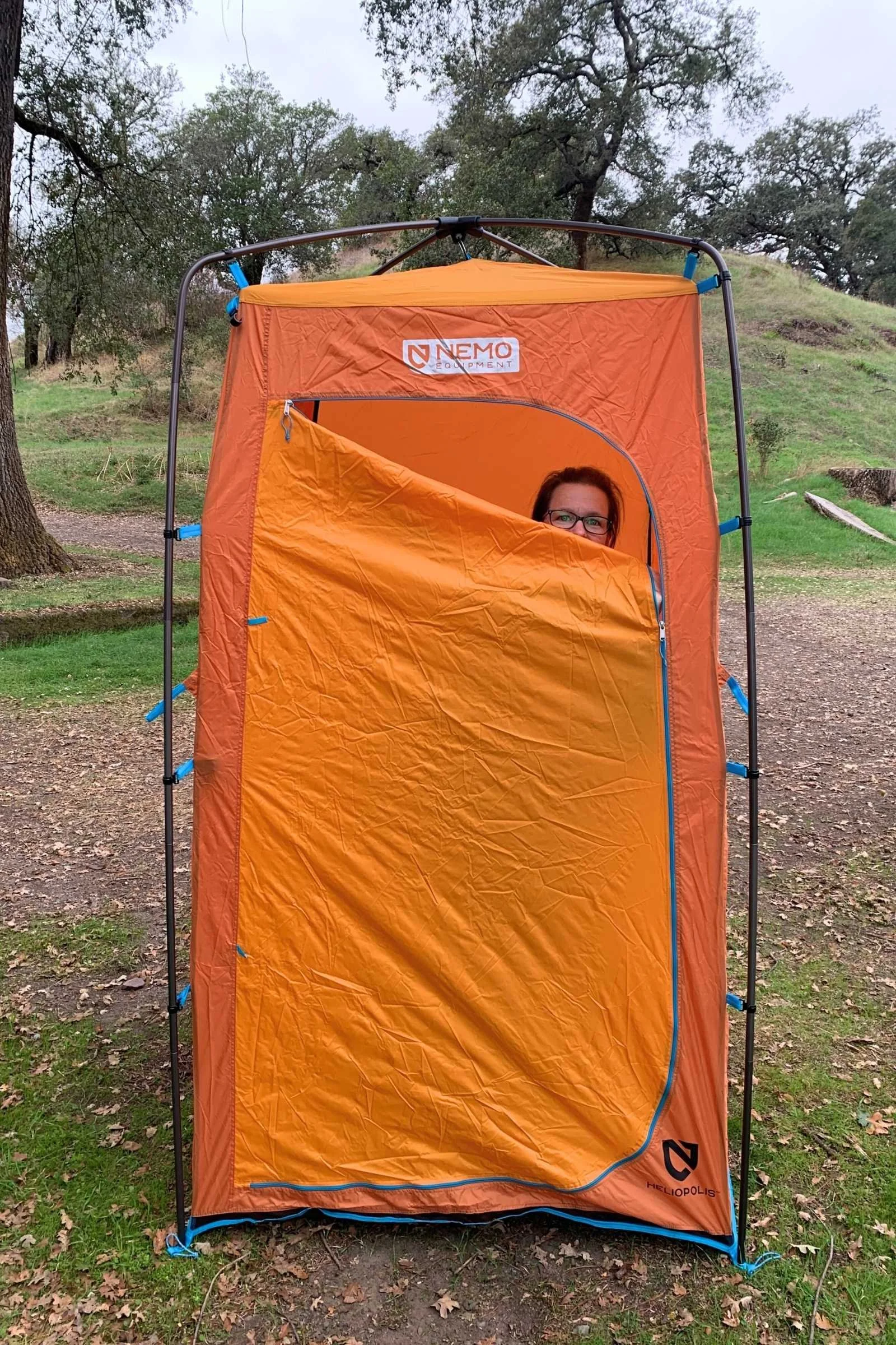 The Nemo Heliopolis shower tent has a wide zip door and plenty of height for most campers.