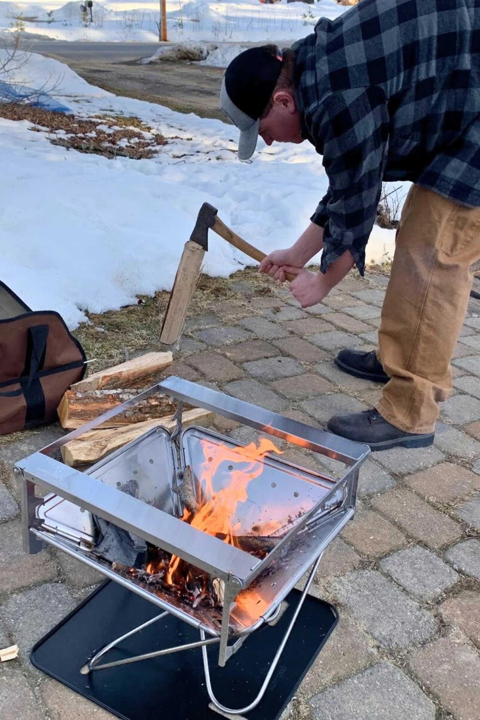 Chopping wood to feed the Snow Peak Takibi fire pit.