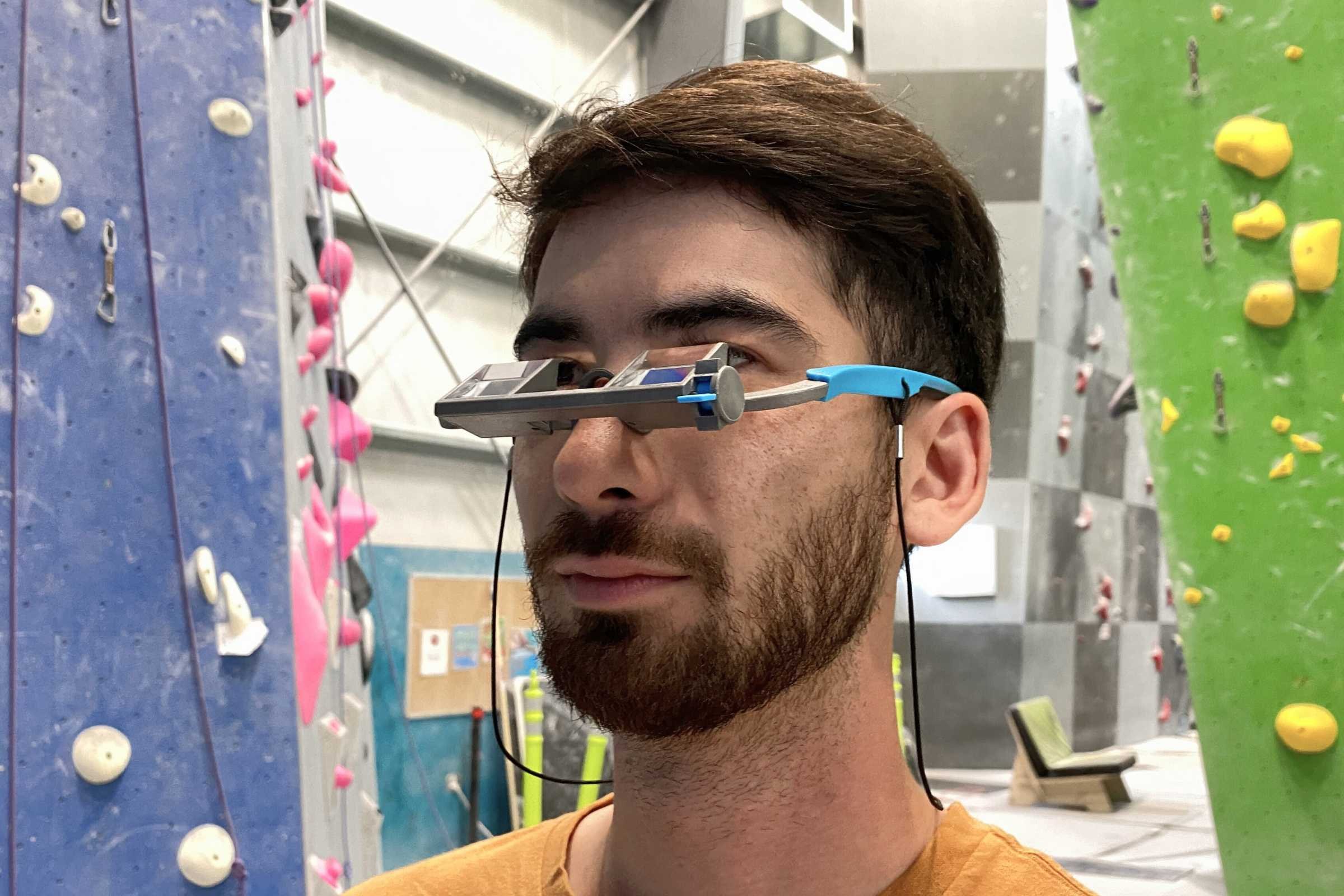 Wearing the PitchSix EyeSend Belay Glasses in the gym.