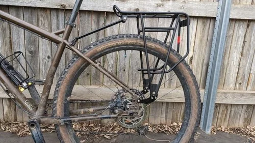 The Axiom Streamliner rack features tabs to ensure it clears the disc brake calipers on any bike.