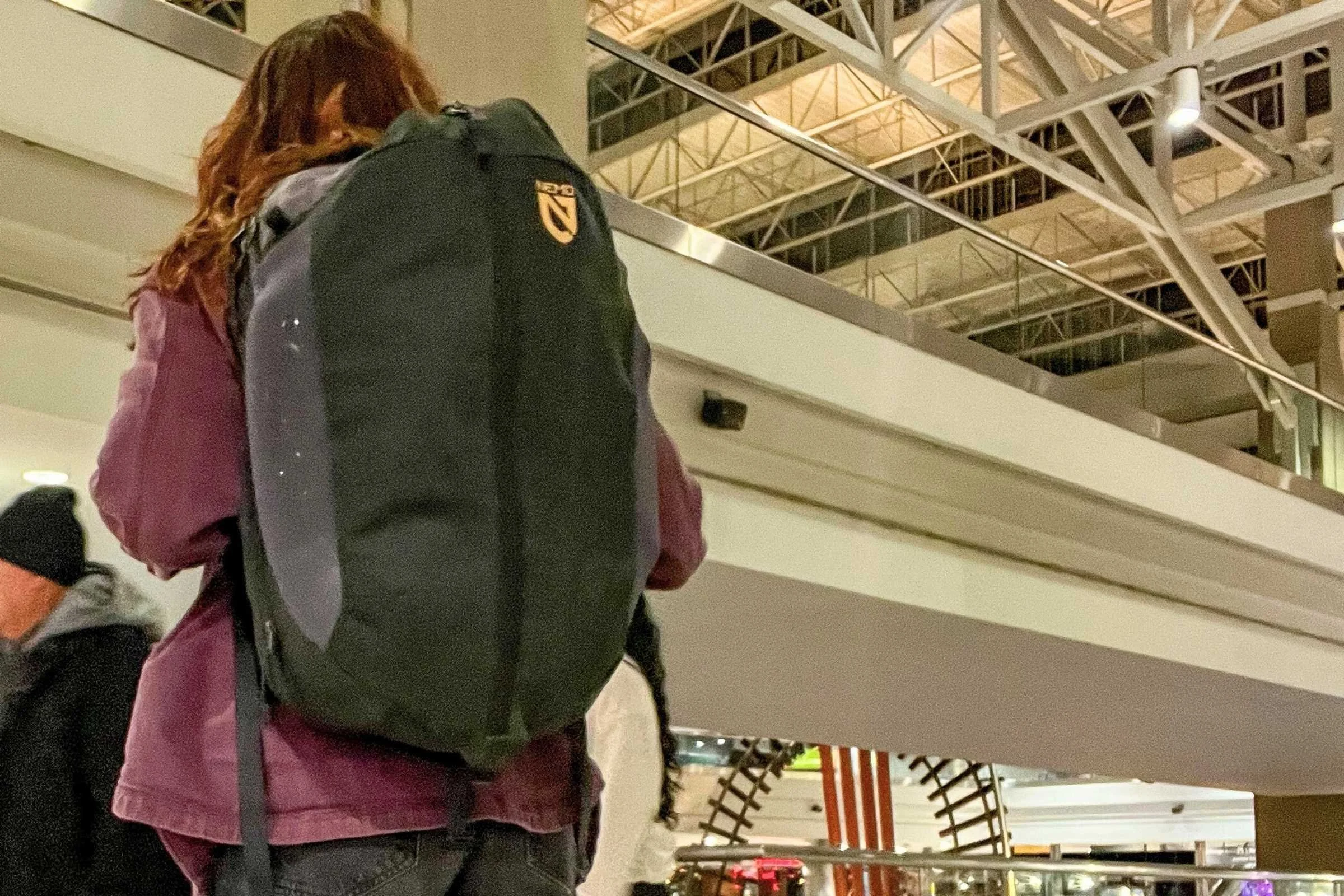 Woman with the NEMO Vantage 30L Endless Promise Adventure Daypack on her back