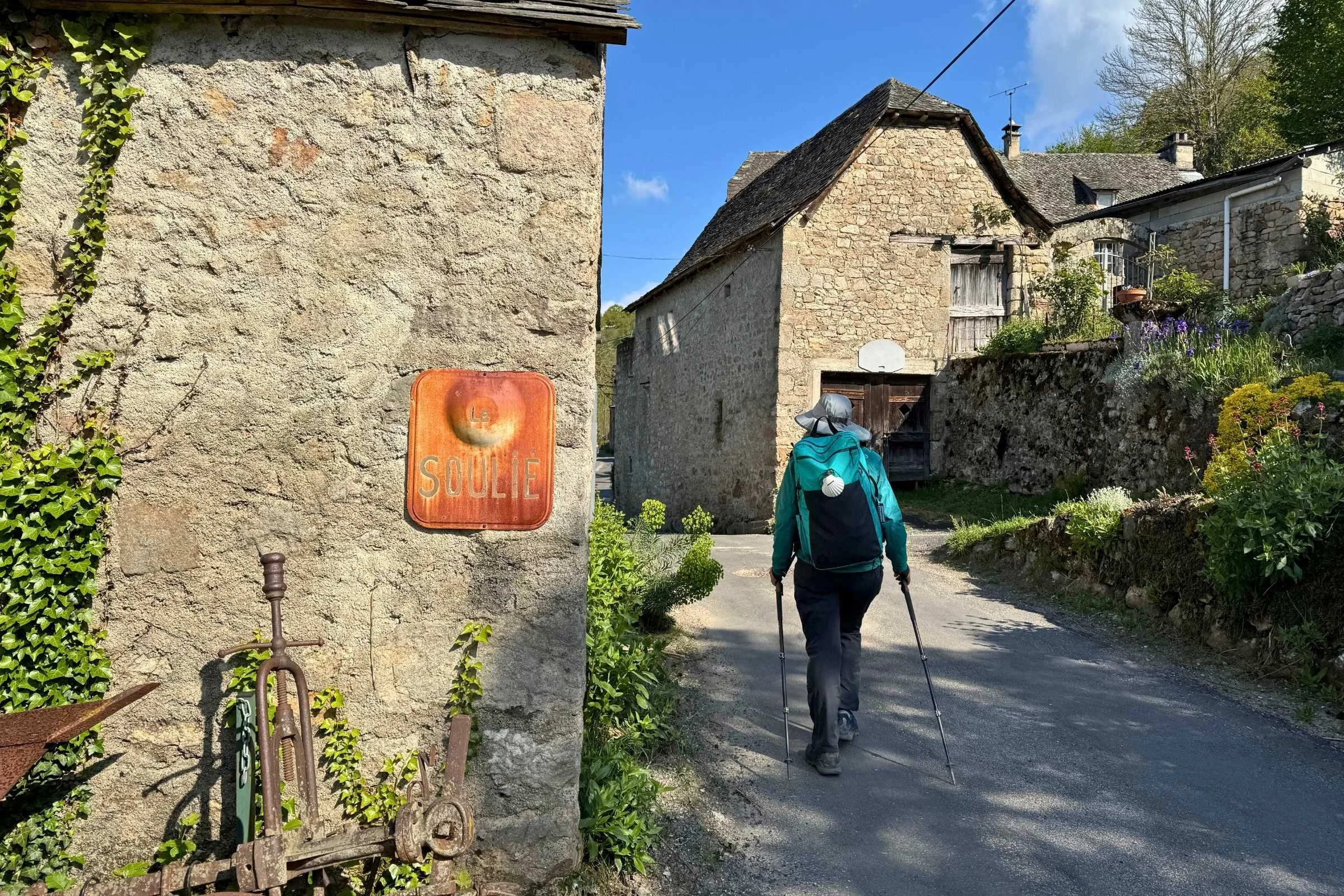 Pilgrim walking the Camino De Santiago with the Six Moon Designs All Day Carry 