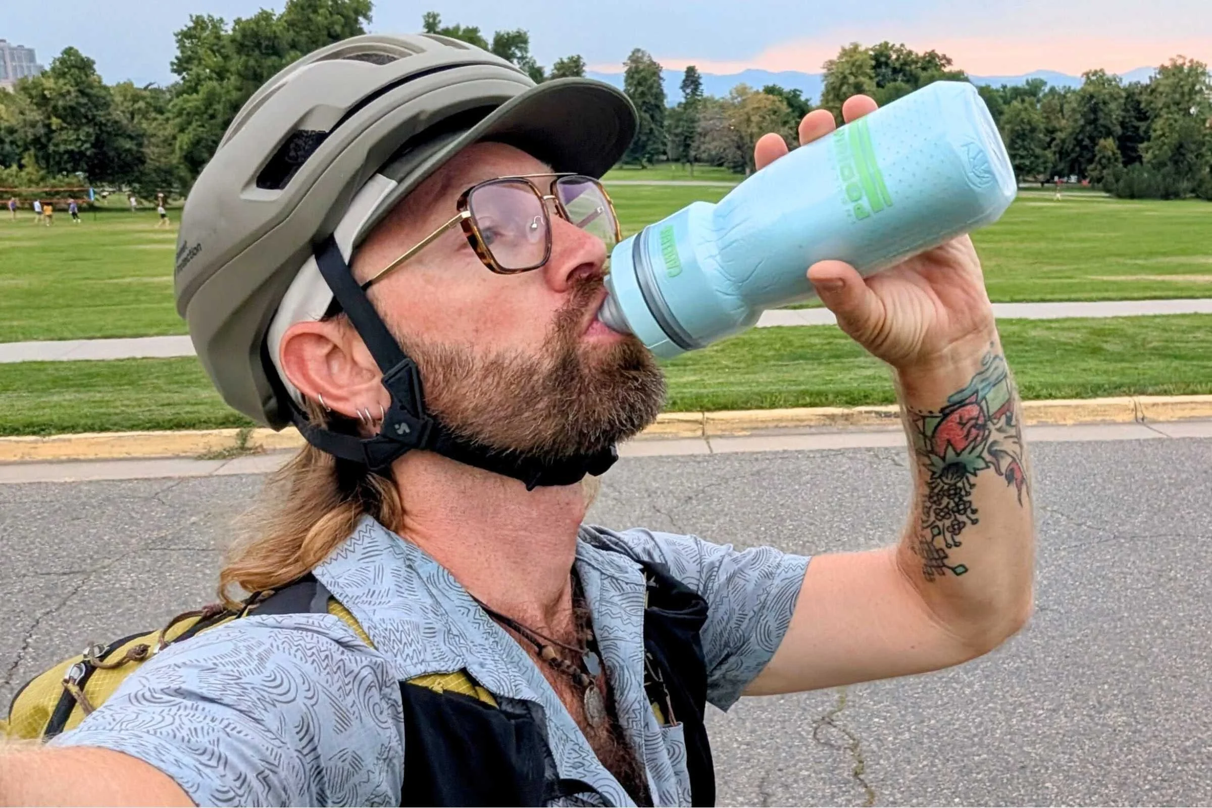 Biker drinking out of the CamelBak Podium Chill 21 