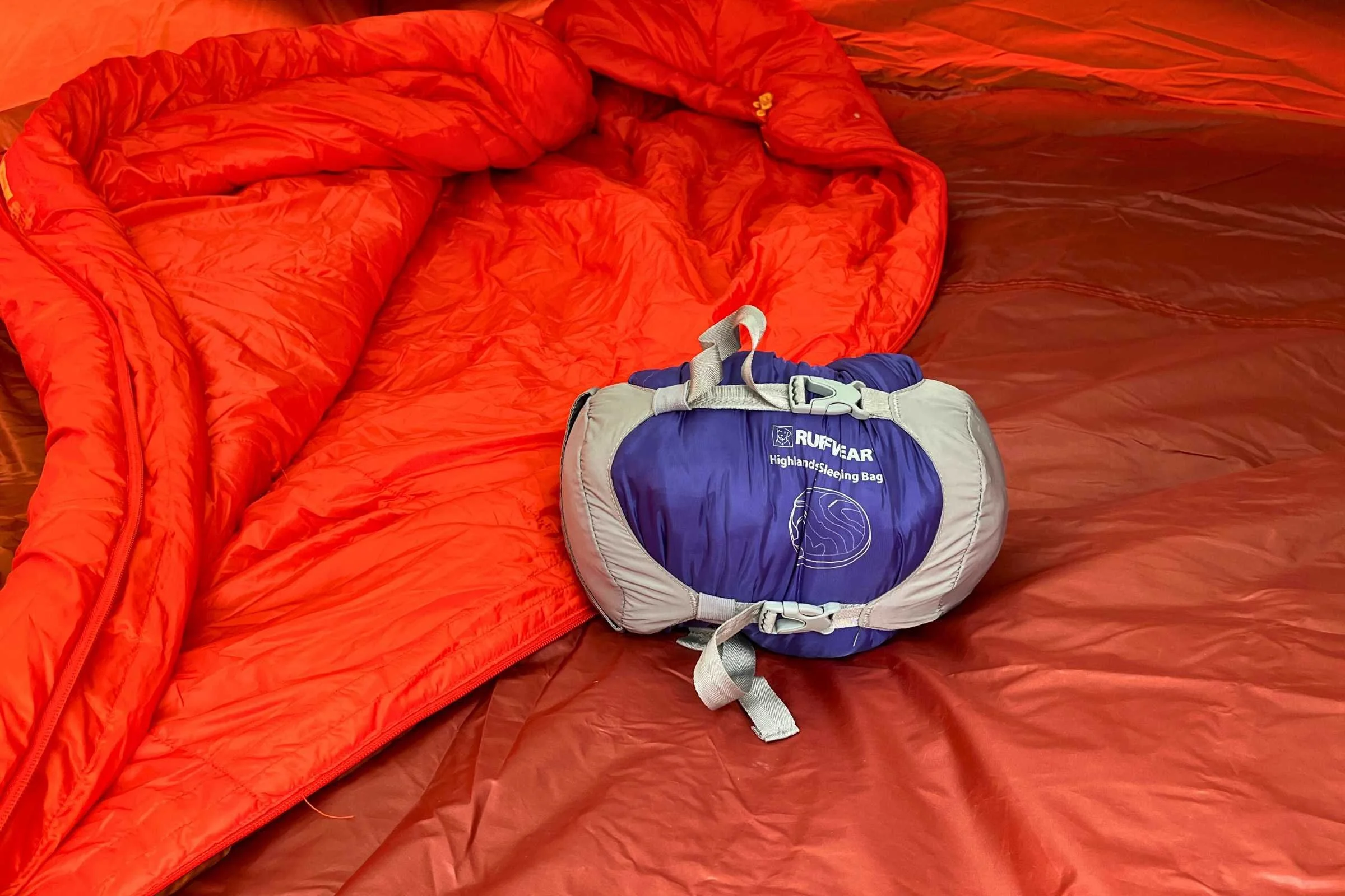 The Ruffwear Highlands dog sleeping bag had the best compression sack we tested. It’s super durable and helps the bag get down to a reasonable size. Photo by Jae Thomas