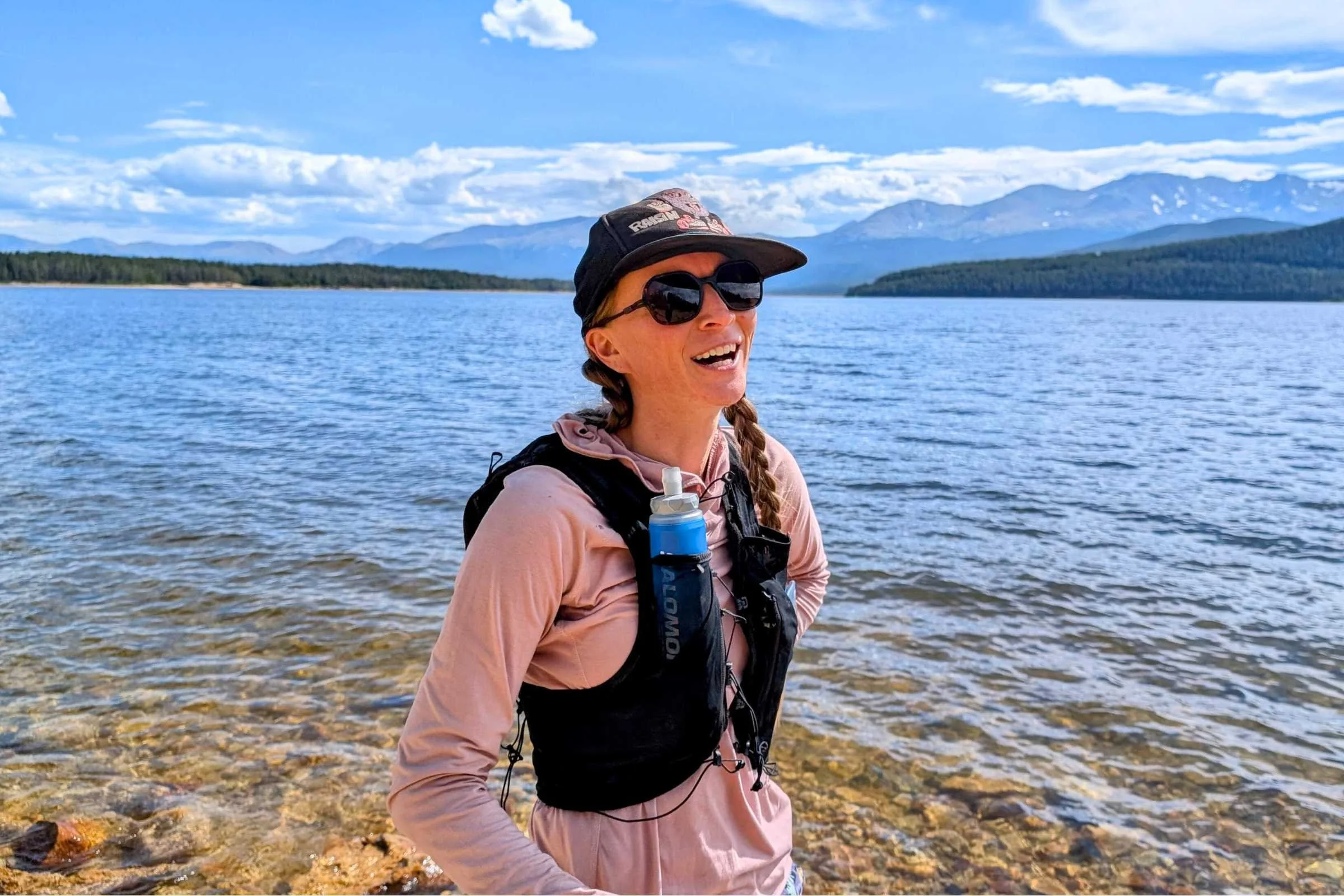 Runner wearing a running vest with the Salomon Soft Flask 500mL