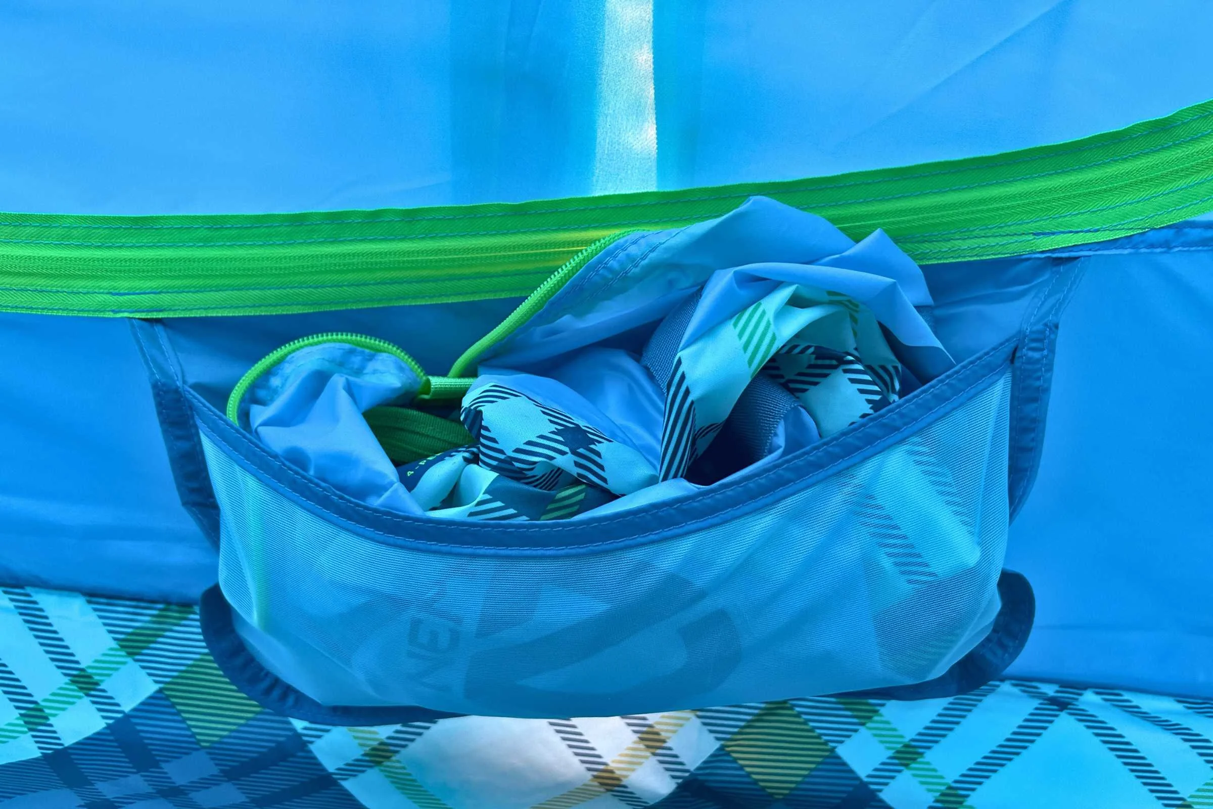 Shirt stuffed in one of the gear pockets inside the NEMO Aurora Highrise camping tent