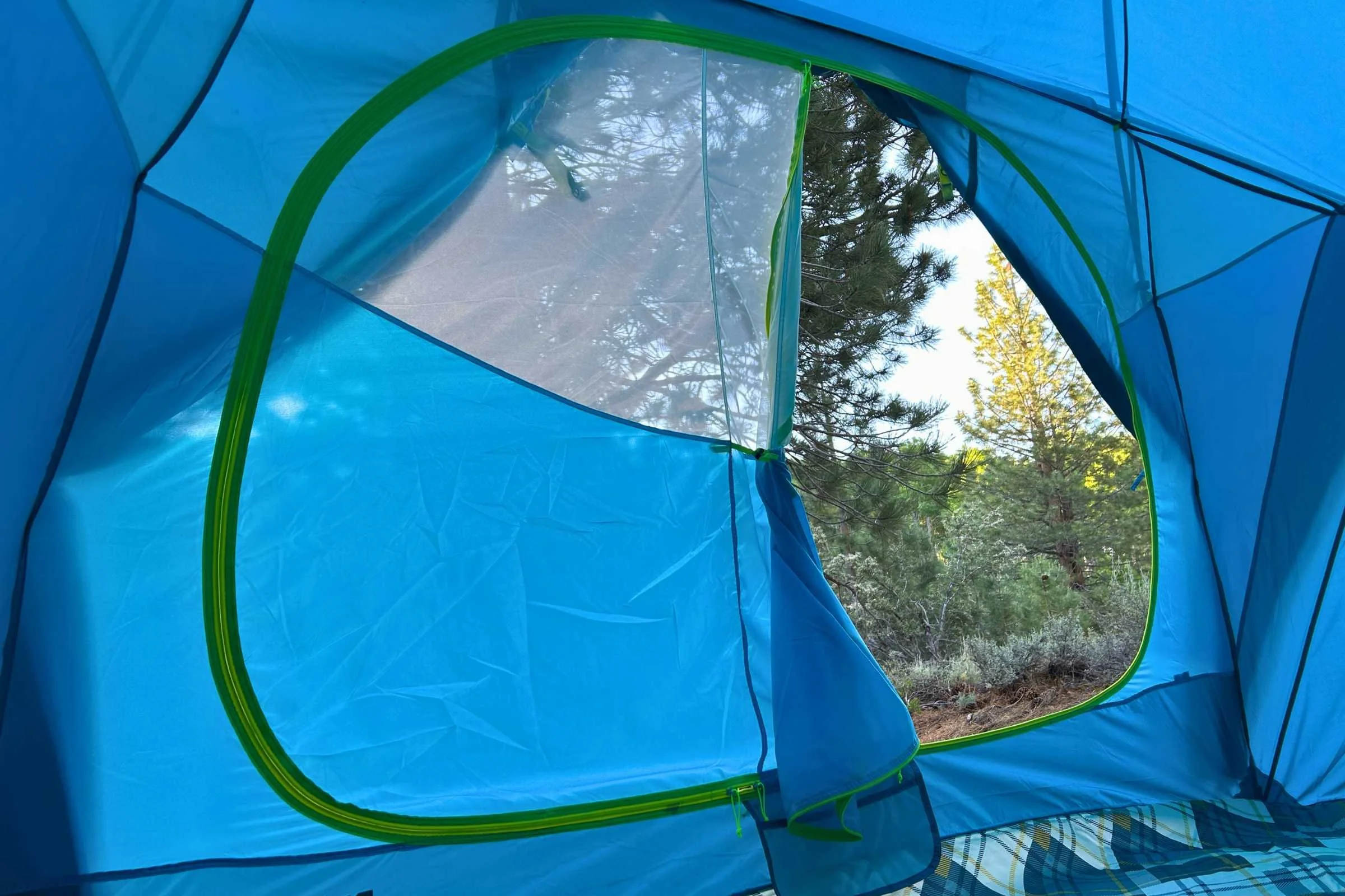 View outside the front door from inside the NEMO Aurora Highrise camping tent