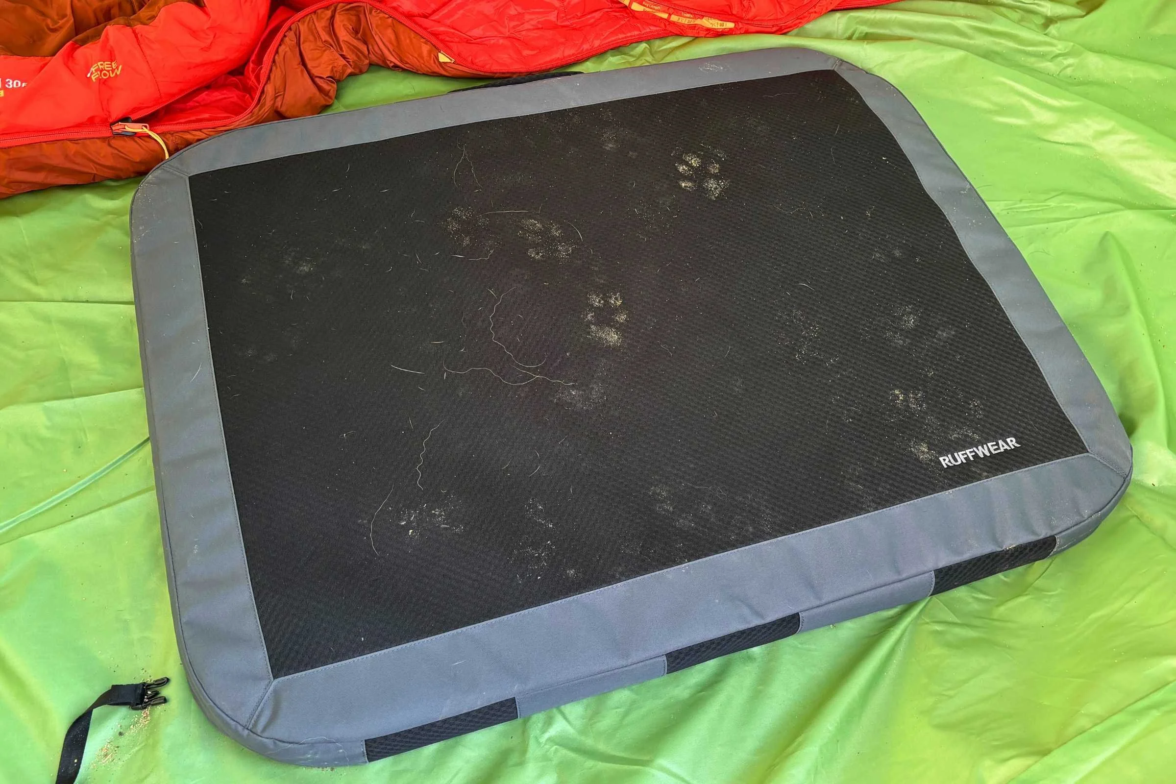 Muddy pawprints accumulate fairly easily on this bed.